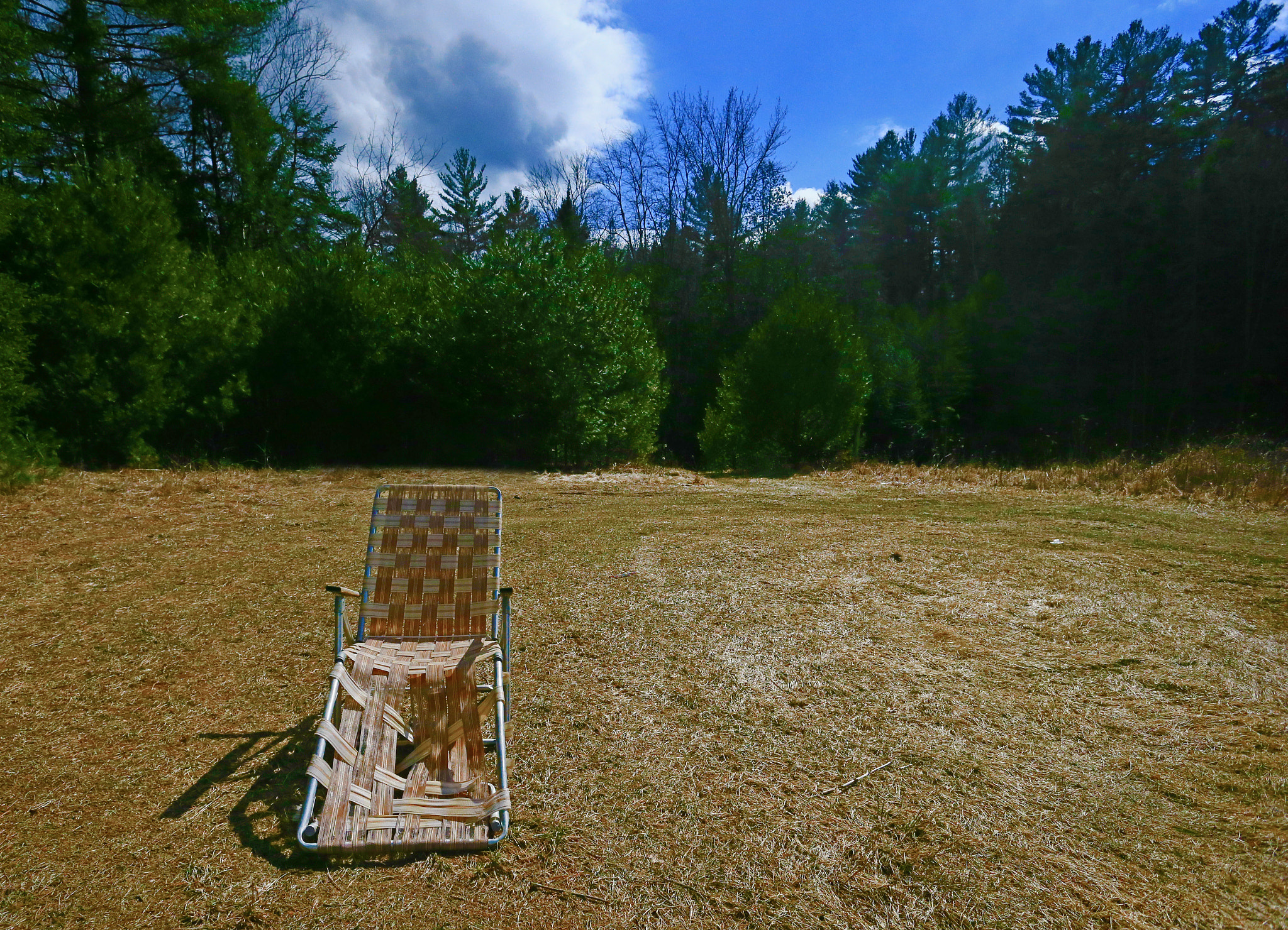 Canon EOS-1D X + Canon EF 17-40mm F4L USM sample photo. Lounge chair by the river photography