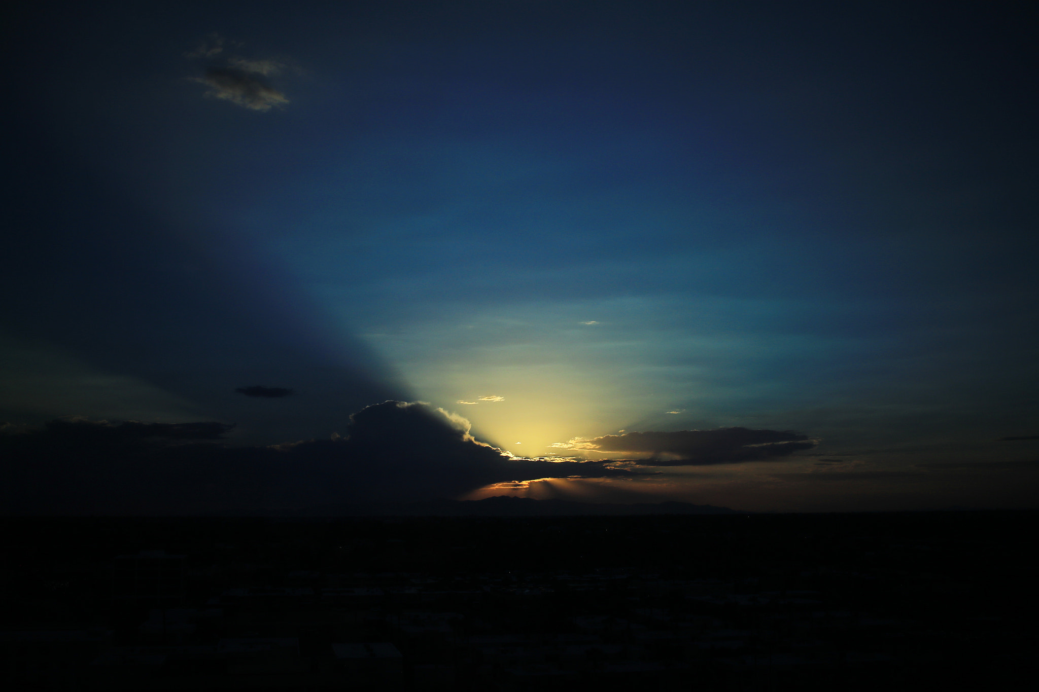 Canon EF-S 24mm F2.8 STM sample photo. Sunset behind the clouds photography
