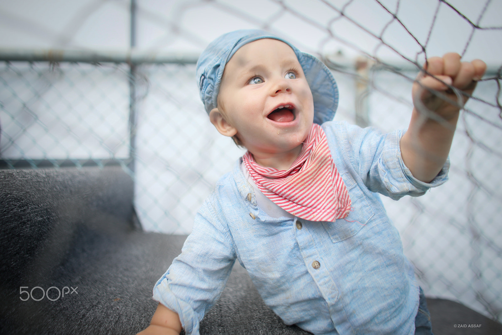 Canon EF 24mm f/1.4L sample photo. Dynamic baby photography