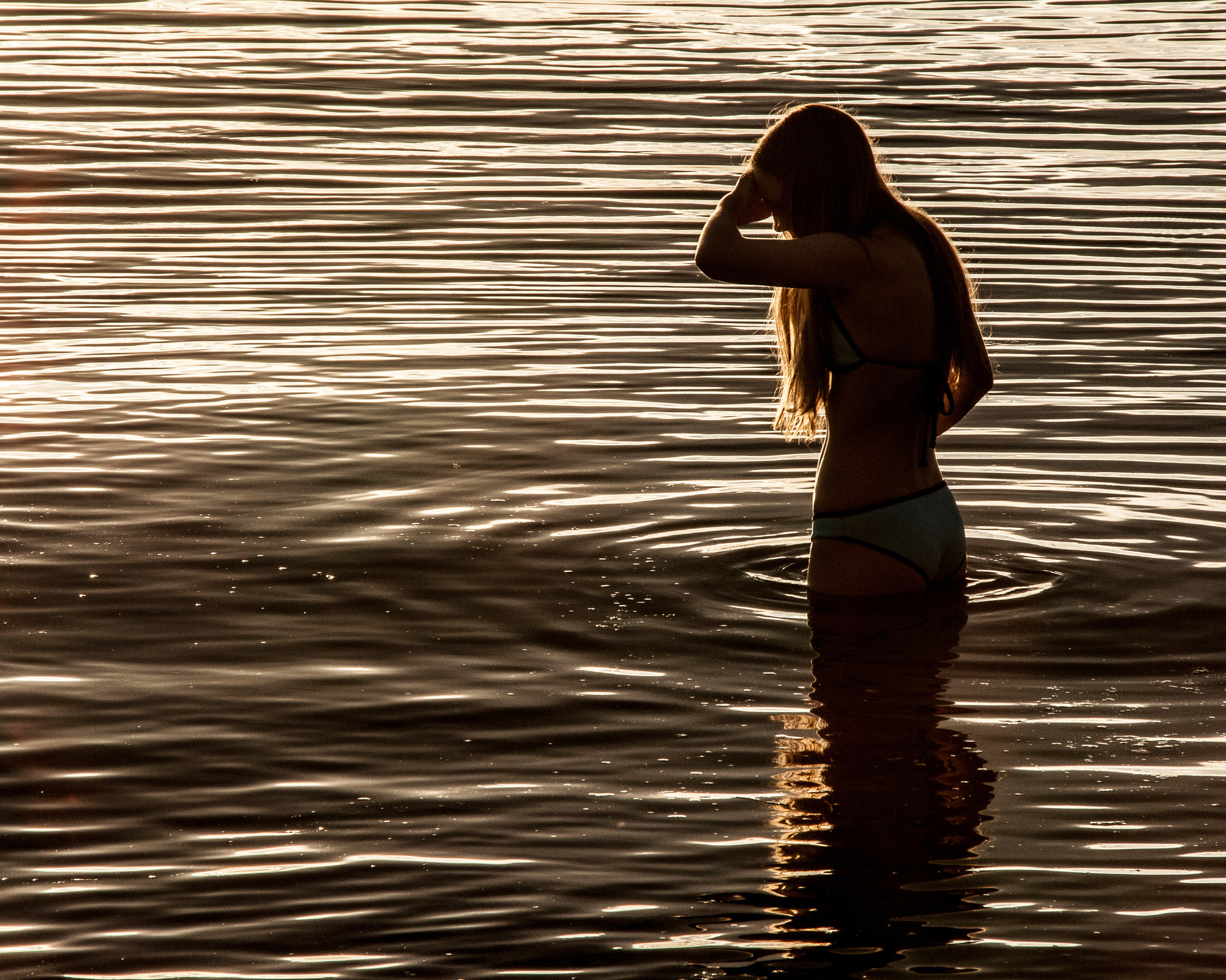 Canon EOS 50D + Sigma 18-250mm F3.5-6.3 DC OS HSM sample photo. Girl in water at sunset photography