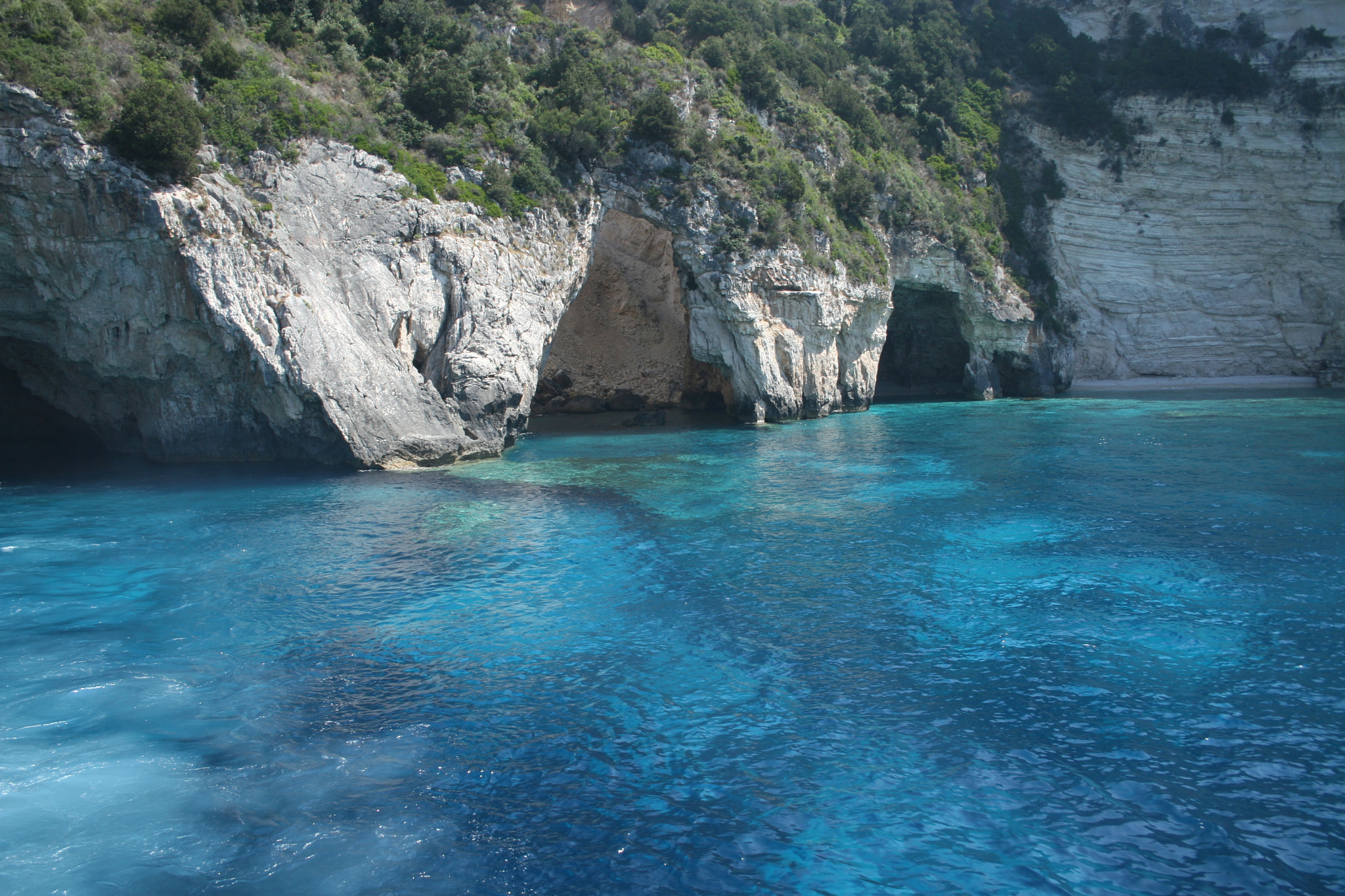 Canon EOS 30D + Canon EF-S 18-55mm F3.5-5.6 sample photo. Caves and a beach photography