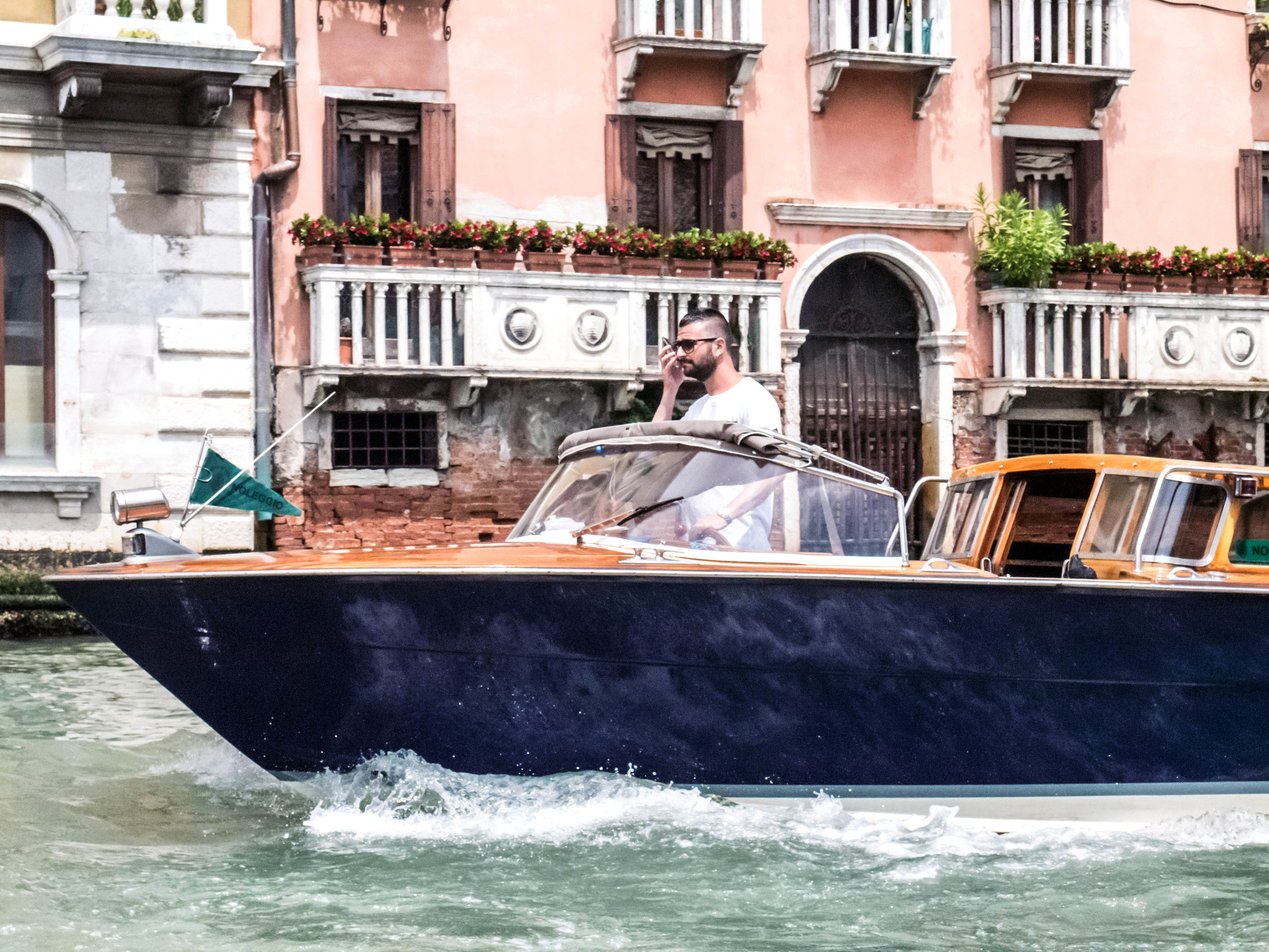 Panasonic Lumix DMC-GF6 sample photo. Talking and driving in venice photography