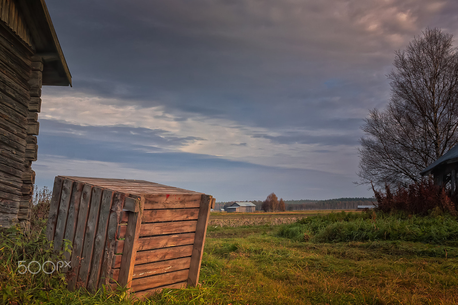 Canon EF-S 24mm F2.8 STM sample photo. Wooden crate by the barn photography