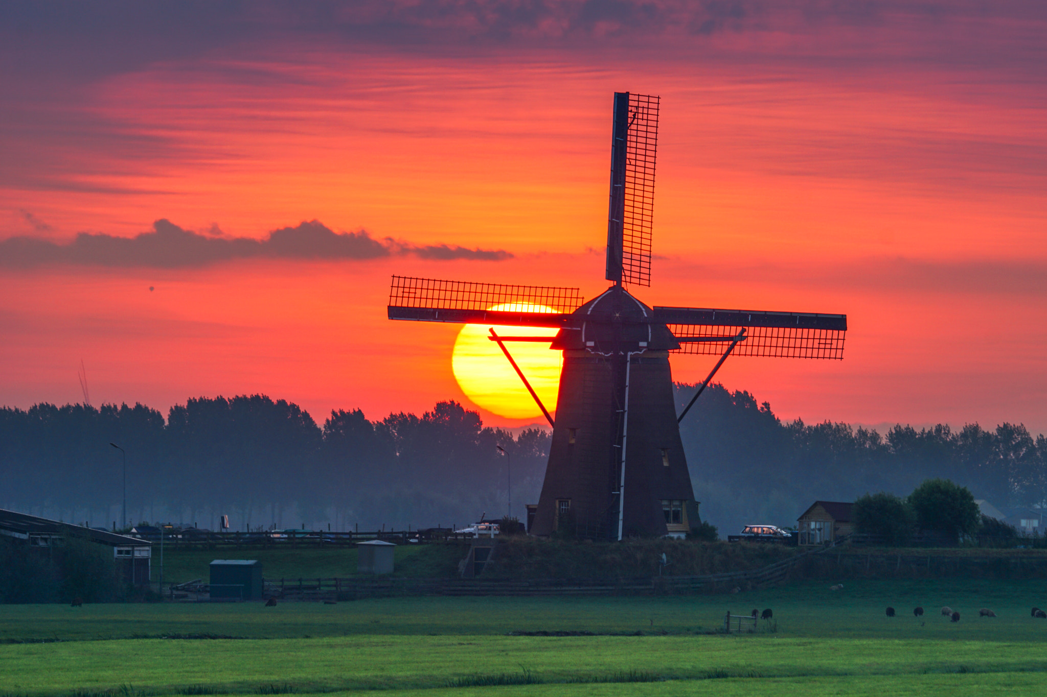 Sony ILCA-77M2 + Sony 70-400mm F4-5.6 G SSM sample photo. Sunrise with windmill photography