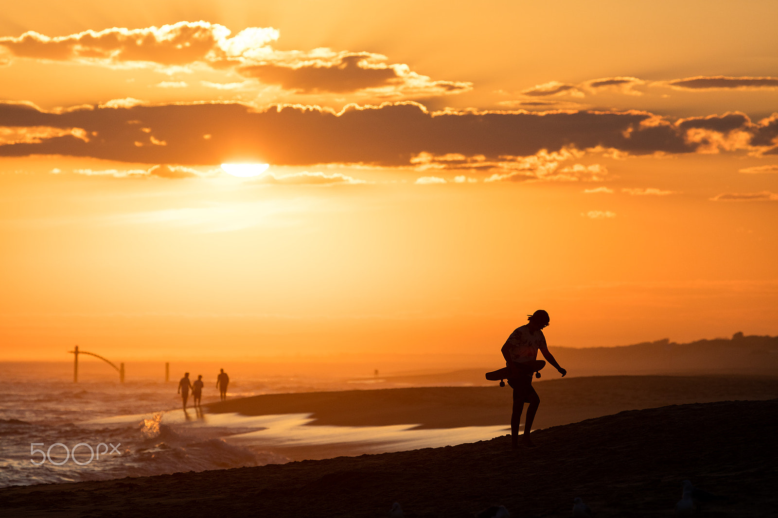 Canon EF 100-400mm F4.5-5.6L IS USM sample photo. Skateboarder at sunset photography