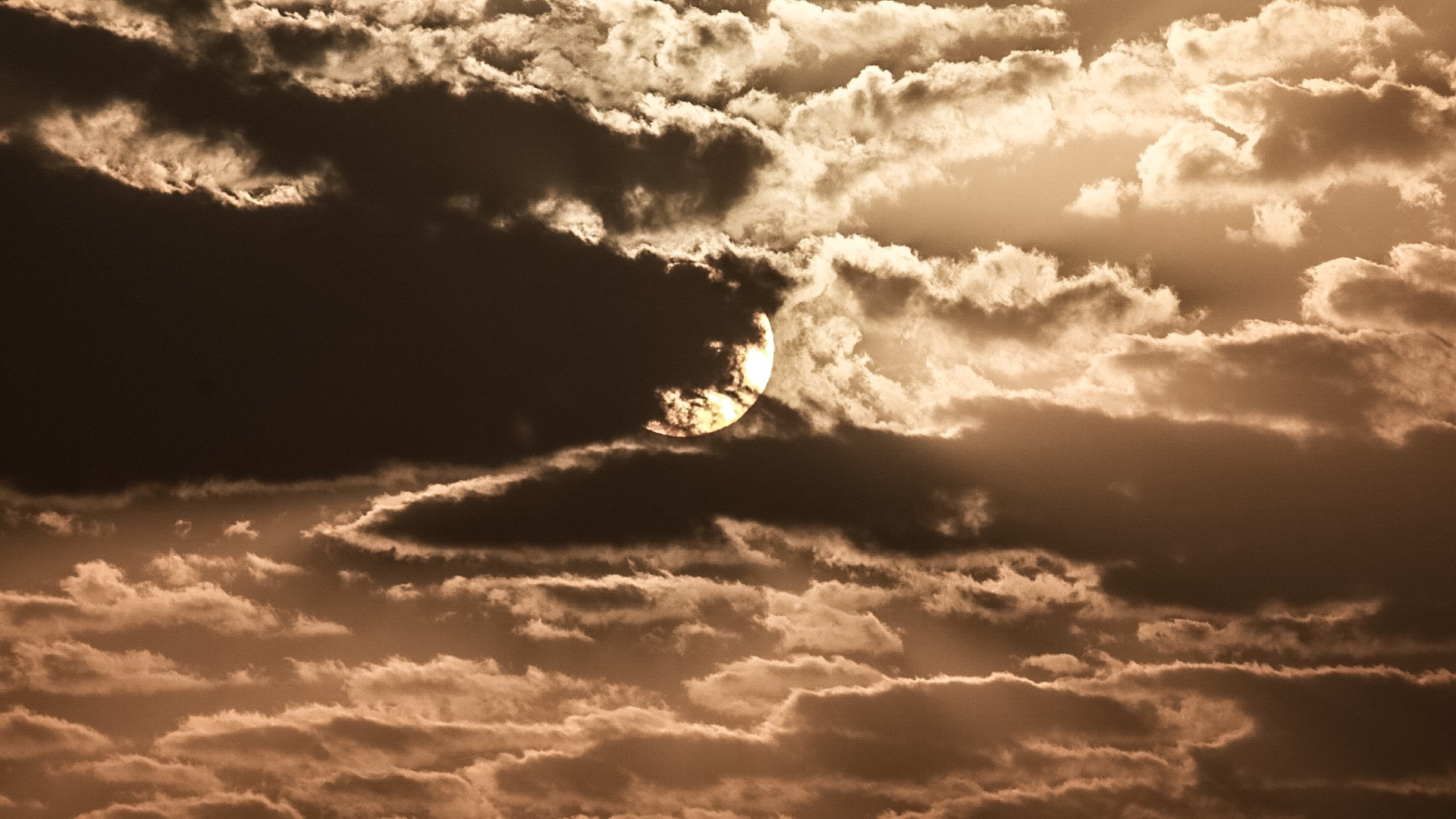 Canon EF 28-300mm F3.5-5.6L IS USM sample photo. The clouds are hugging the sun.. photography