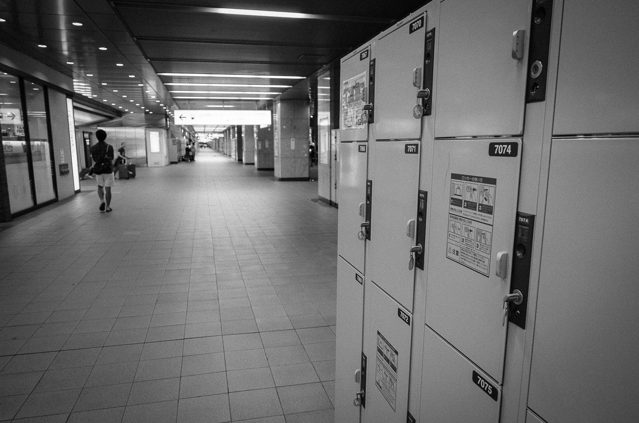 Ricoh GXR A16 sample photo. Storage lockers, kyoto station (b&w) photography