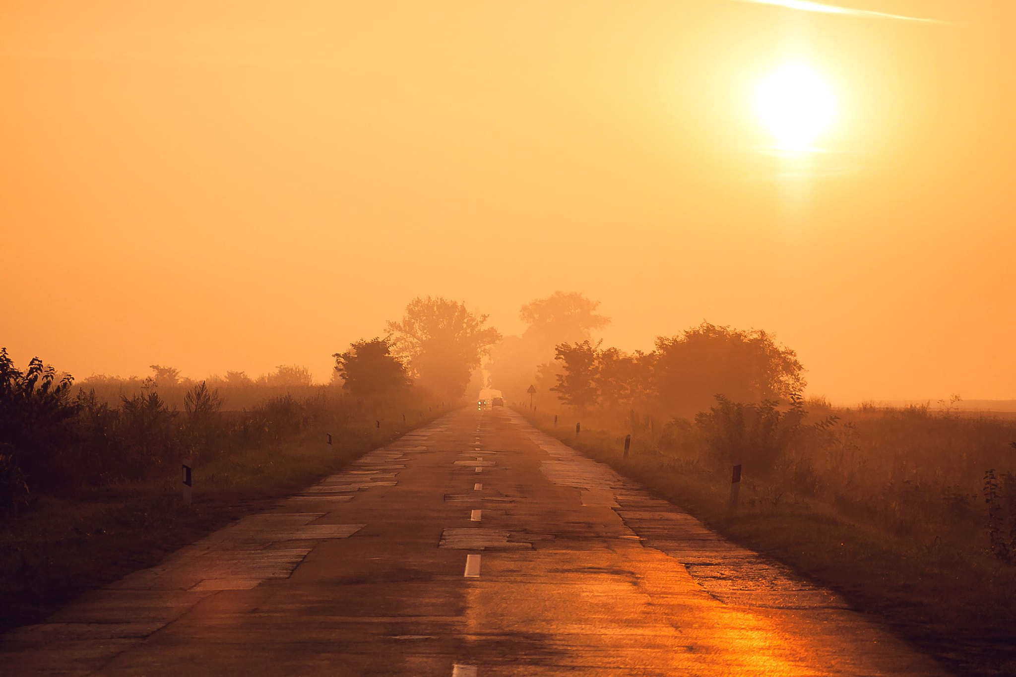 Canon EOS 50D + EF75-300mm f/4-5.6 sample photo. Sun rising over a road. photography