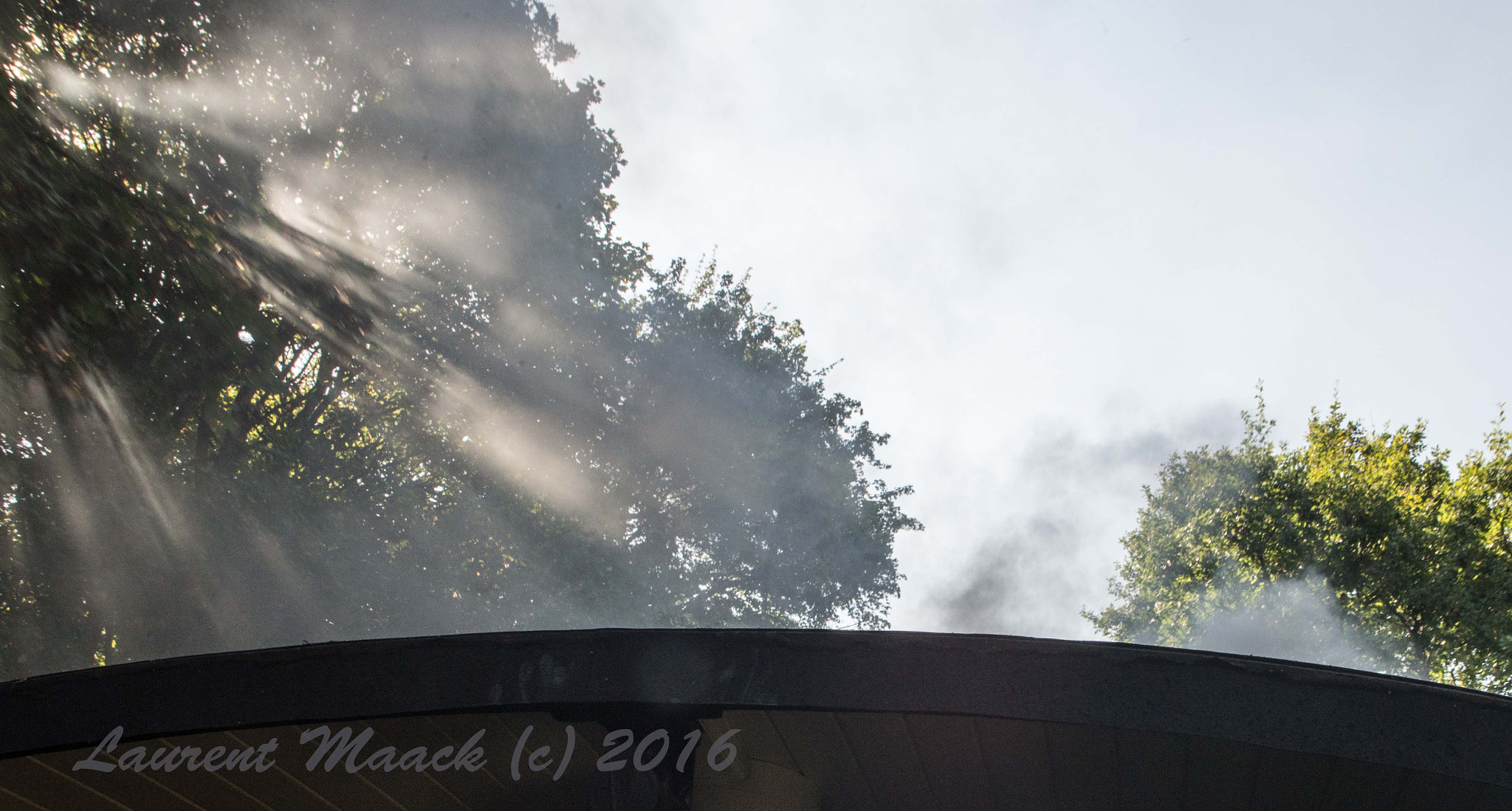 Sigma 28mm F1.8 EX DG Aspherical Macro sample photo. Steamtrain in sunlight photography