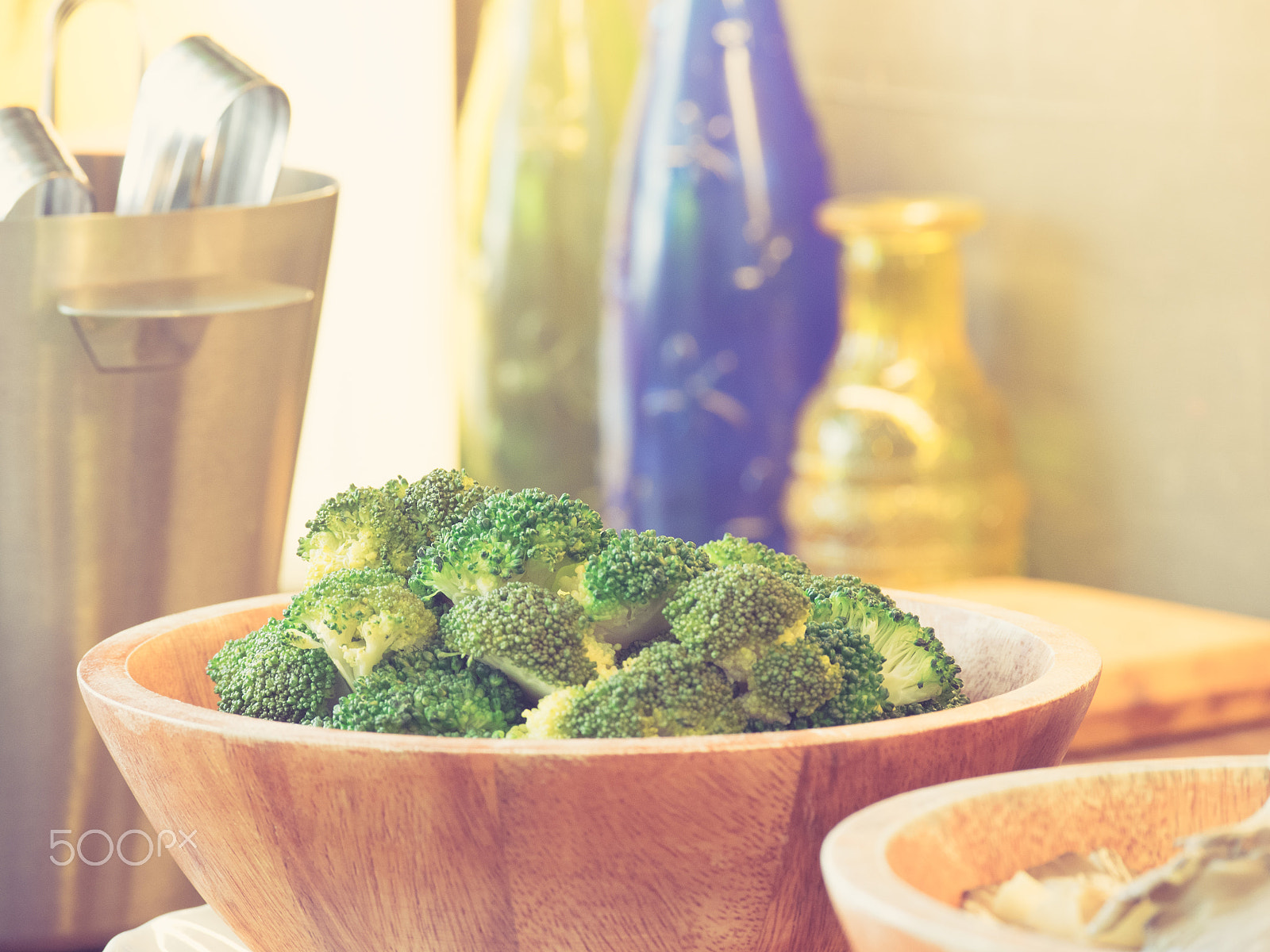 Olympus OM-D E-M1 + Panasonic Lumix G X Vario 35-100mm F2.8 OIS sample photo. Fresh broccoli  in bowl on wooden table close up concept for hea photography