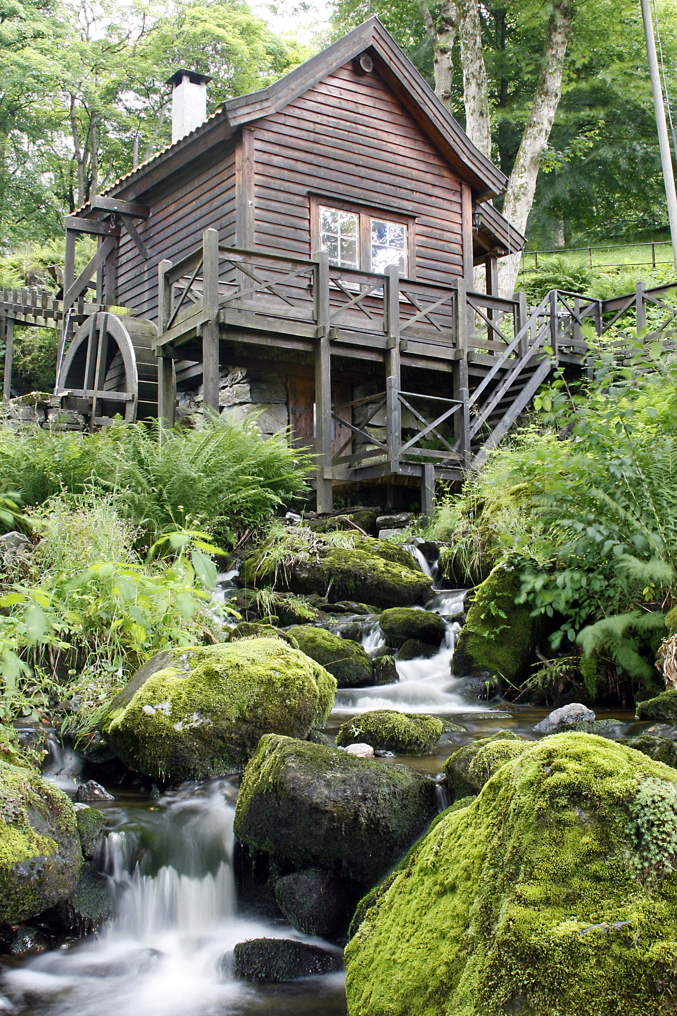 Canon EF 28-135mm F3.5-5.6 IS USM sample photo. Watermill in the park photography