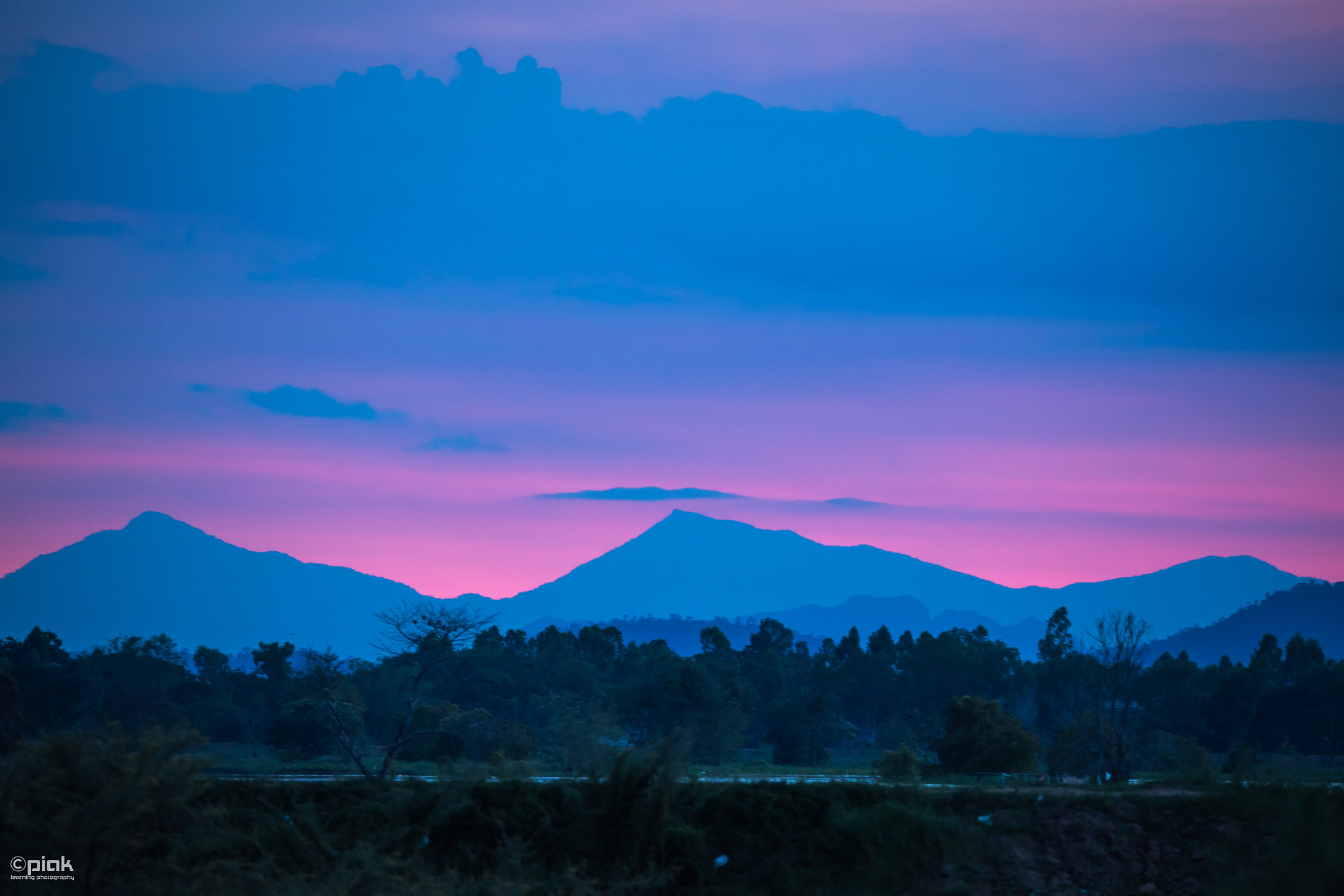 150-600mm F5-6.3 DG OS HSM | Sports 014 sample photo. Silhouette mountain range photography