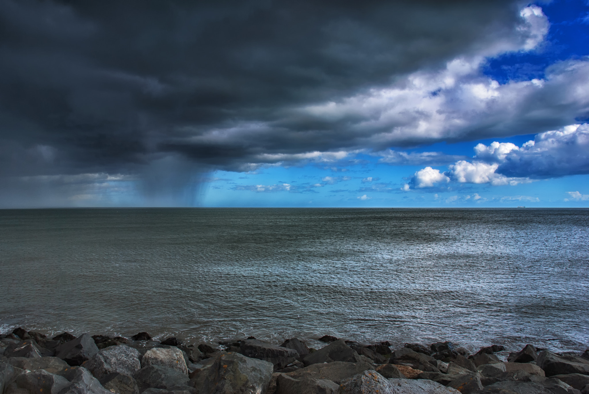 Sigma 18-200mm F3.5-6.3 DC OS HSM sample photo. Clouds and sun photography