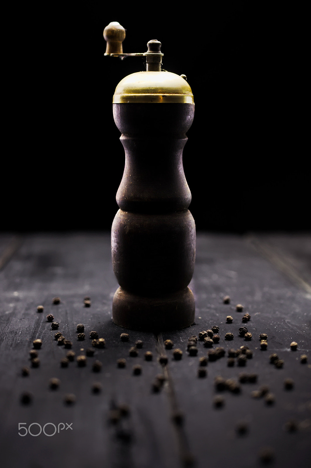 Nikon AF-S DX Micro Nikkor 40mm F2.8 sample photo. Old rustic antique pepper and salt grinder on wood boards photography