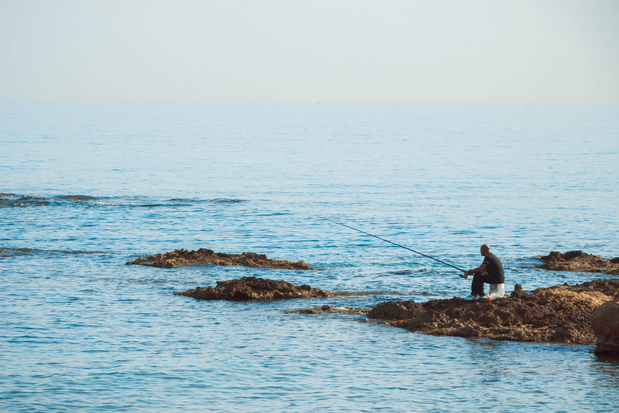 Canon EOS 600D (Rebel EOS T3i / EOS Kiss X5) + Sigma 18-125mm F3.8-5.6 DC OS HSM sample photo. The fisherman photography