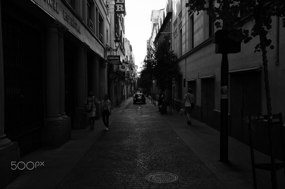 Nikon AF-S Nikkor 16-35mm F4G ED VR sample photo. Down the street photography