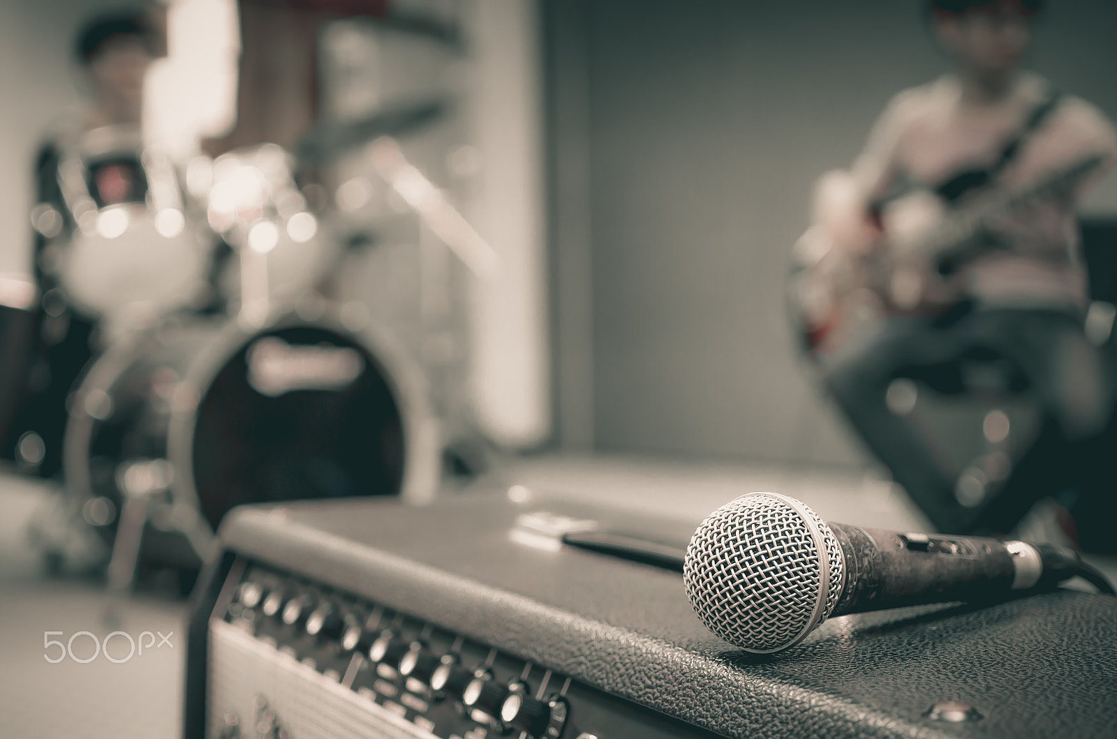 Pentax smc DA 35mm F2.8 Macro Limited sample photo. Closeup of microphone on musician blurred background photography