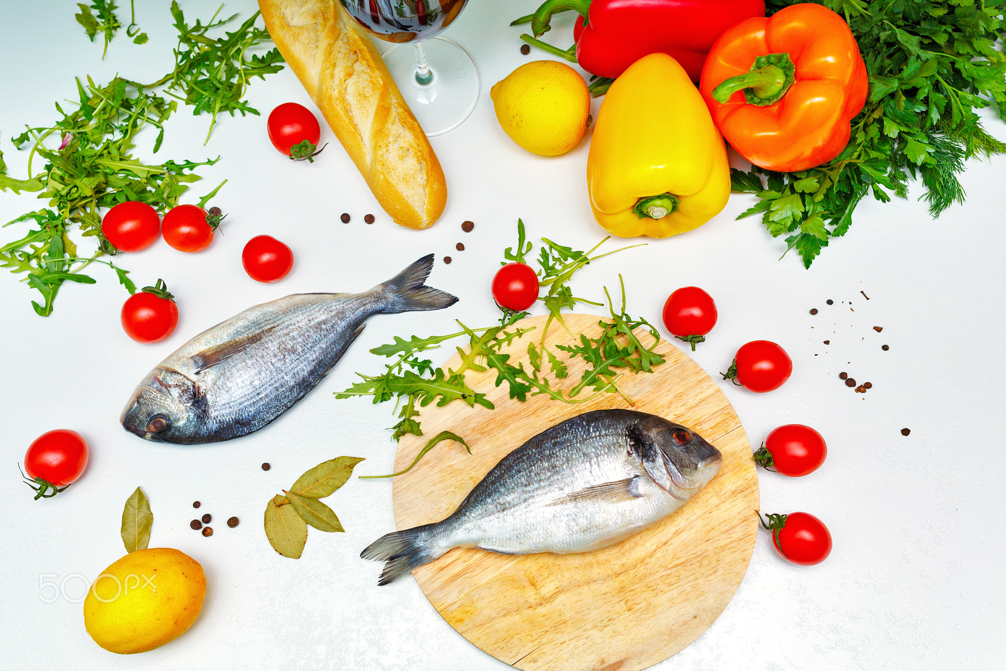 Still life. Food. Vegetables, bread and fish.