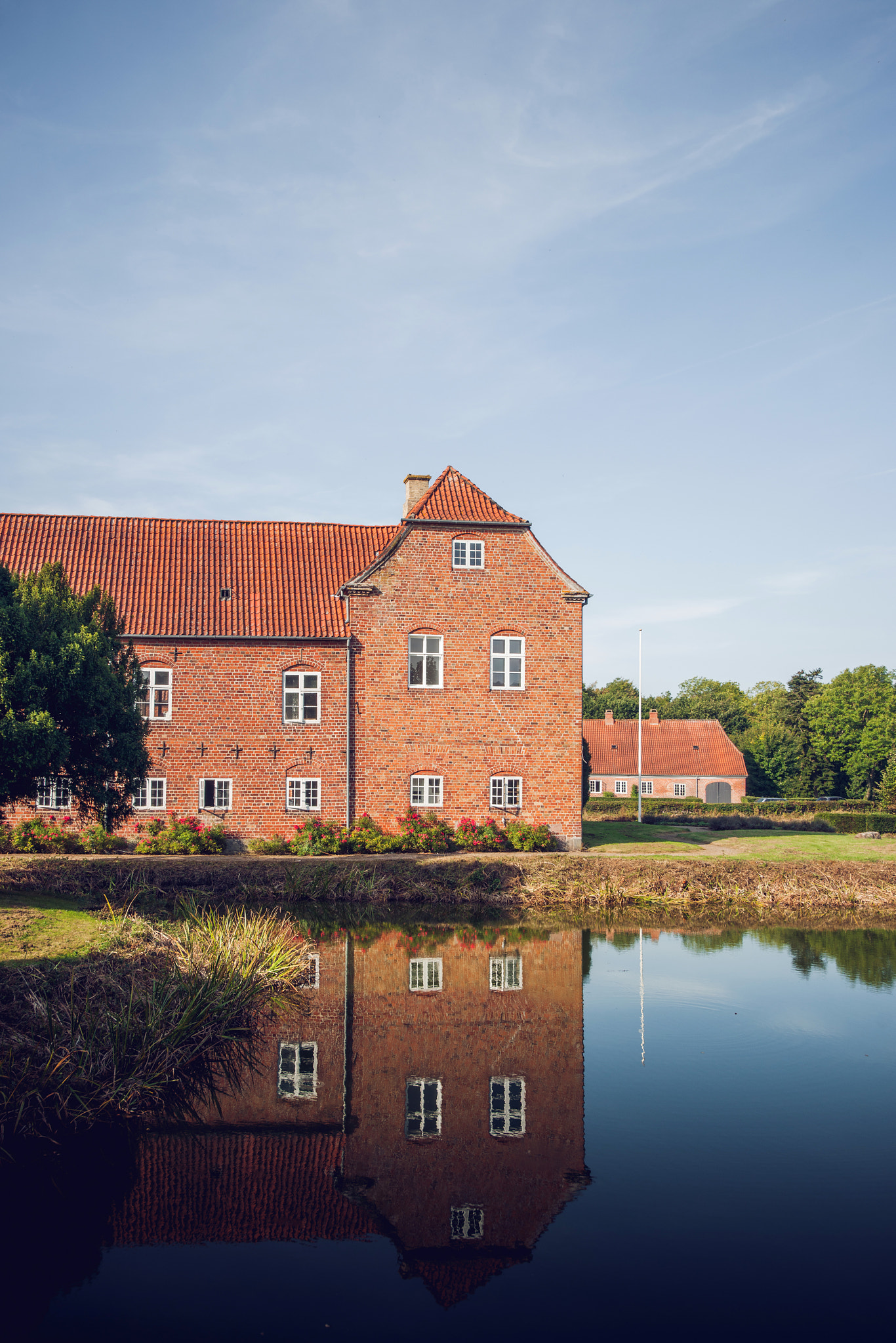 Sony Alpha DSLR-A900 sample photo. Castle made of red bricks with reflection photography