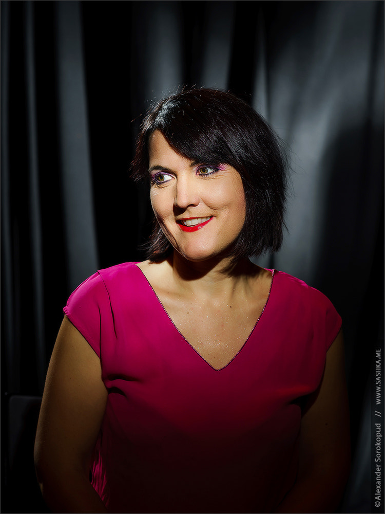 Sony a99 II sample photo. Retro-styled studio portrait of young woman photography