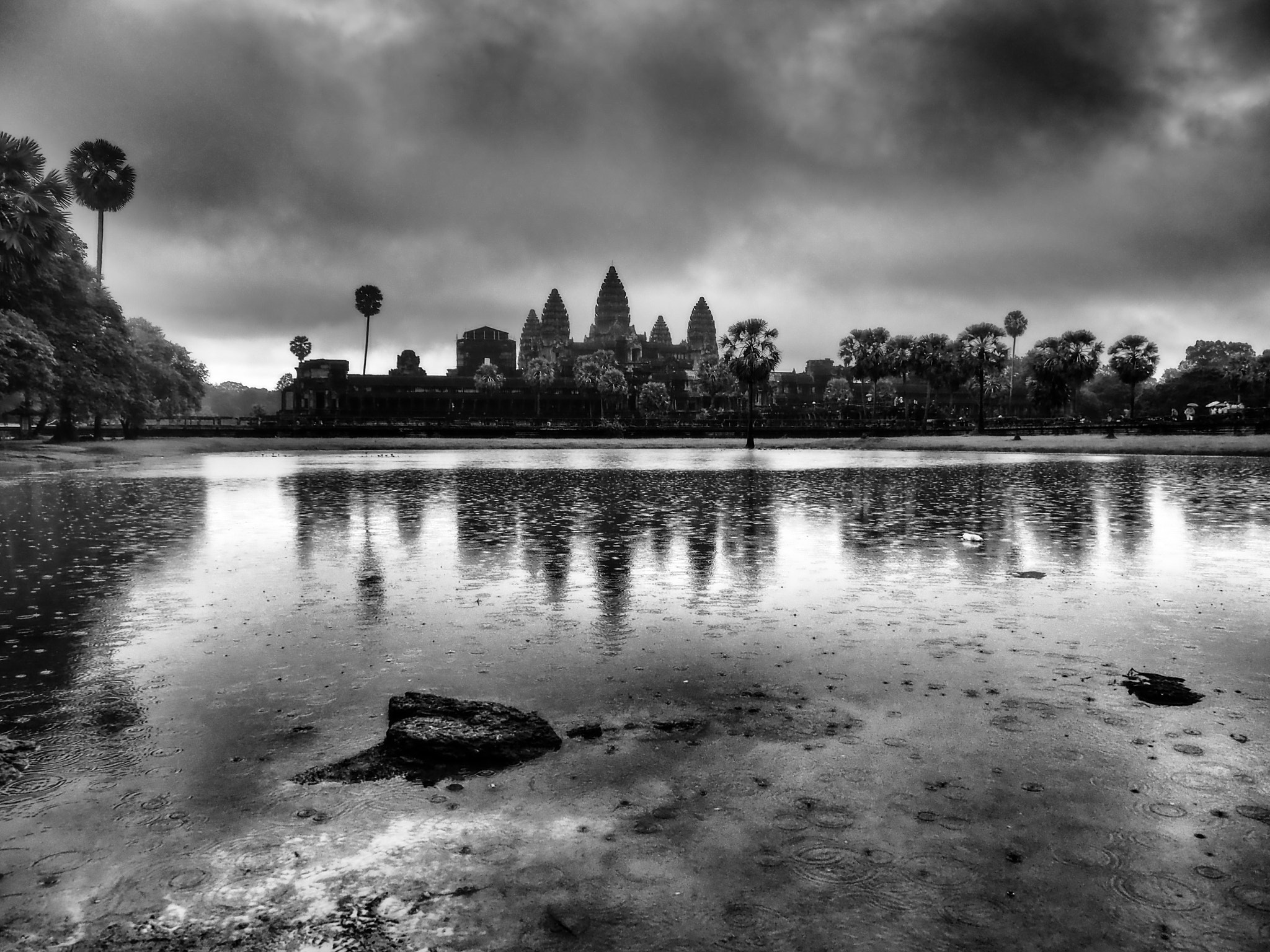 Olympus OM-D E-M10 sample photo. Angkor wat in rain photography