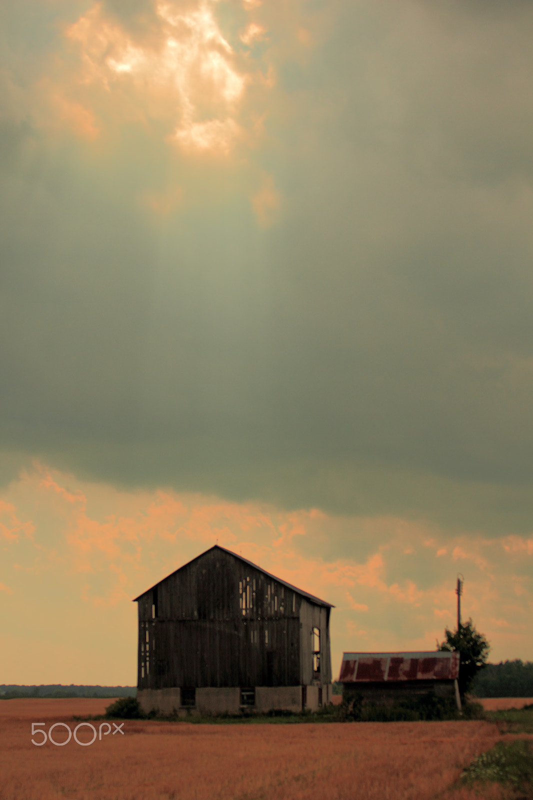 Canon EF 35-80mm f/4-5.6 USM sample photo. Sun on barn photography