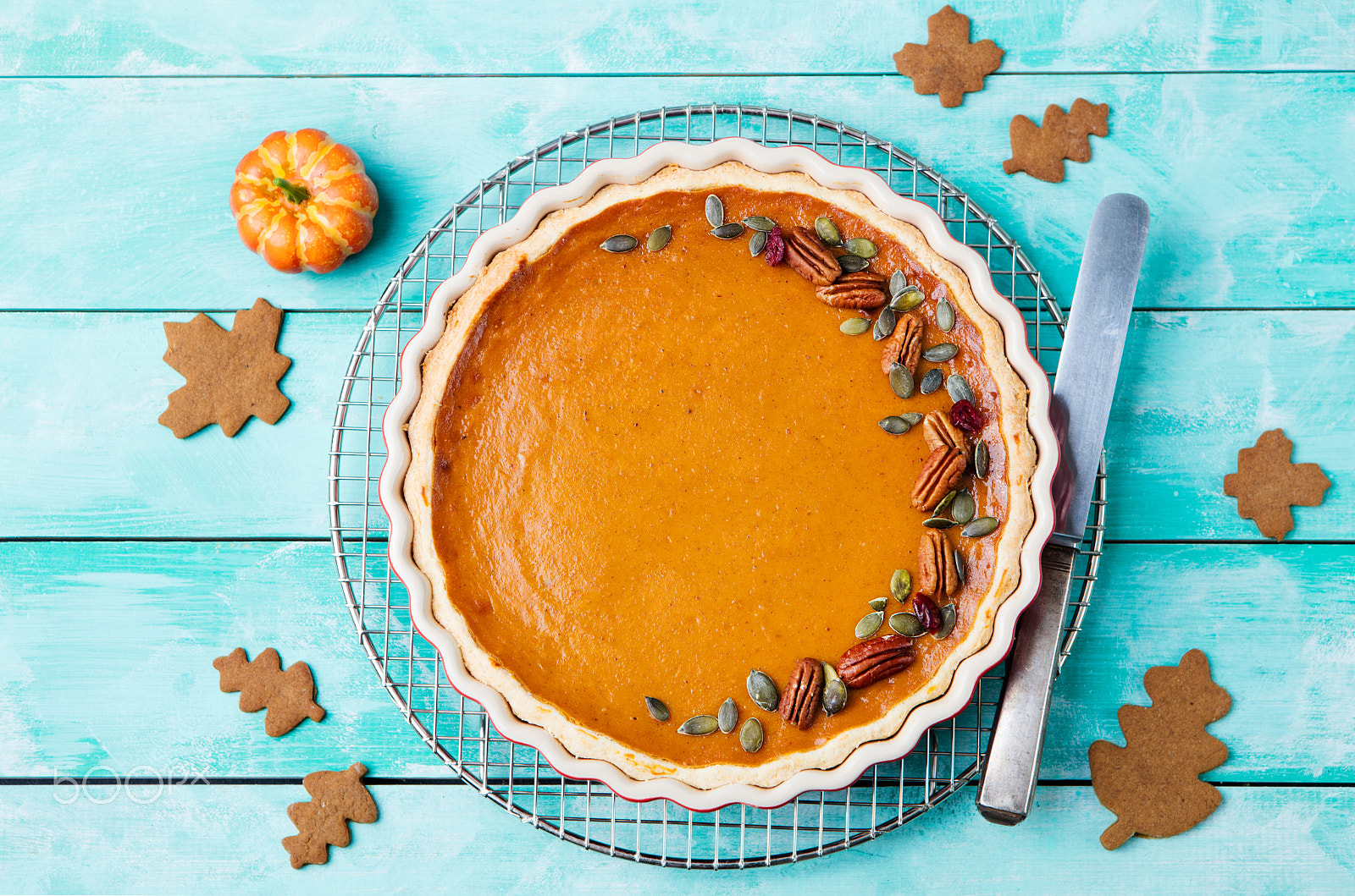 Canon EOS 5DS + Canon EF 24-70mm F2.8L USM sample photo. Tasty pumpkin pie, tart made for thanksgiving day in a baking dish on a cooling rack. turquoise... photography
