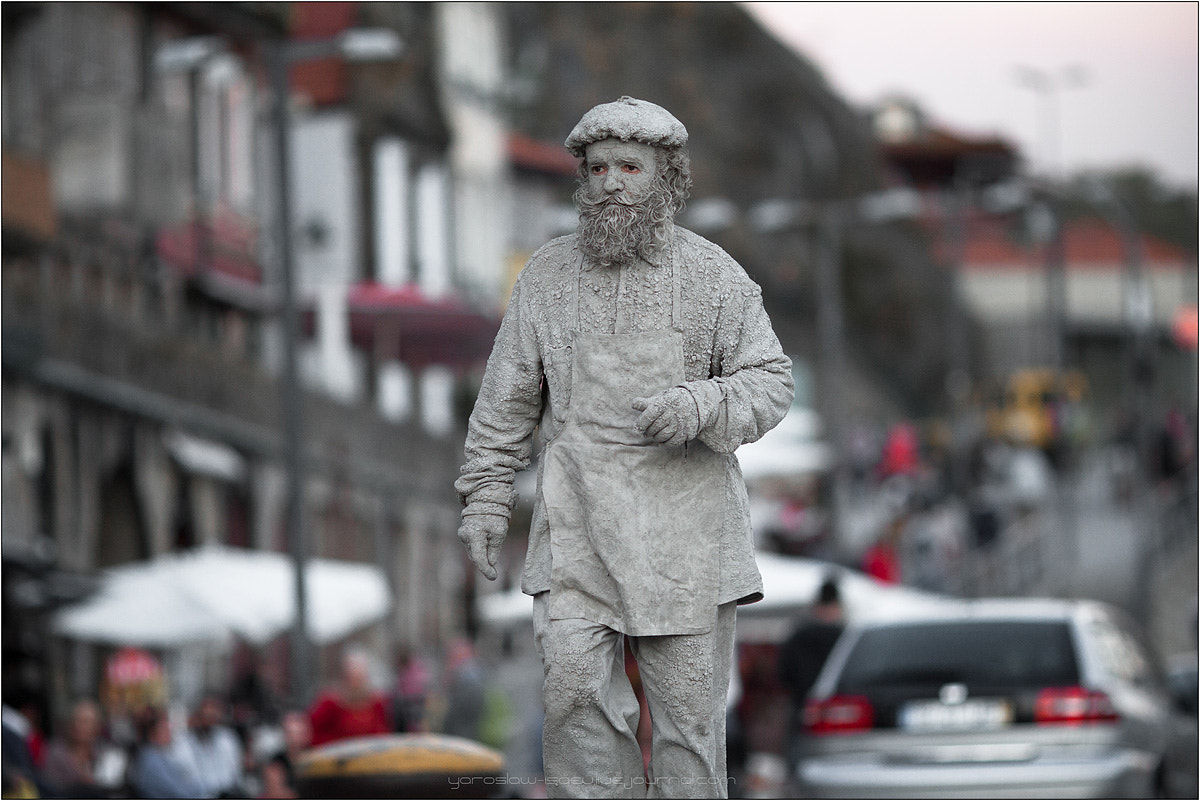 Canon EOS 50D + Canon EF 135mm F2L USM sample photo. Man in porto photography