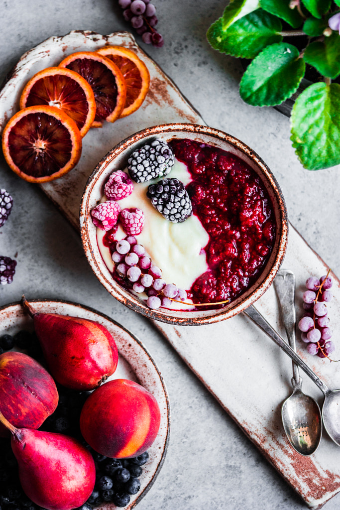 Semolina porridge with raspberries on rustic background by Alena Haurylik on 500px.com