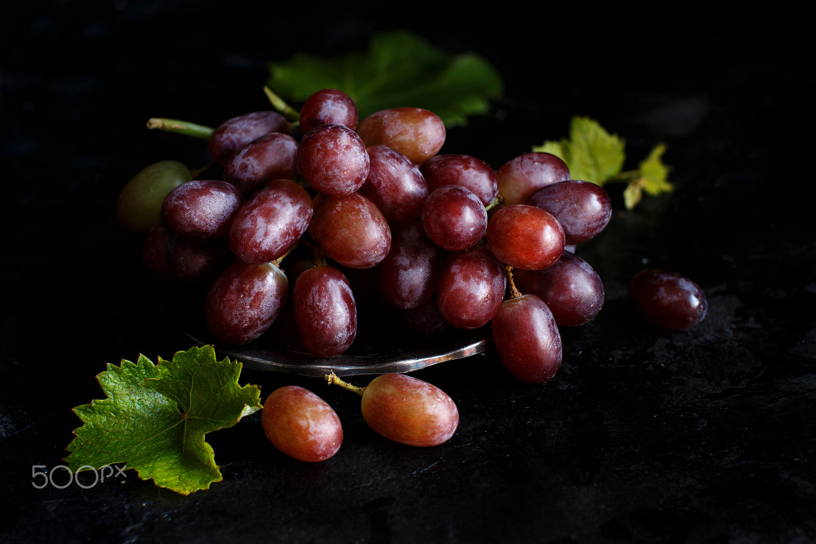 Canon EOS 650D (EOS Rebel T4i / EOS Kiss X6i) + Canon EF 50mm F1.2L USM sample photo. Red grapes on a dark background photography