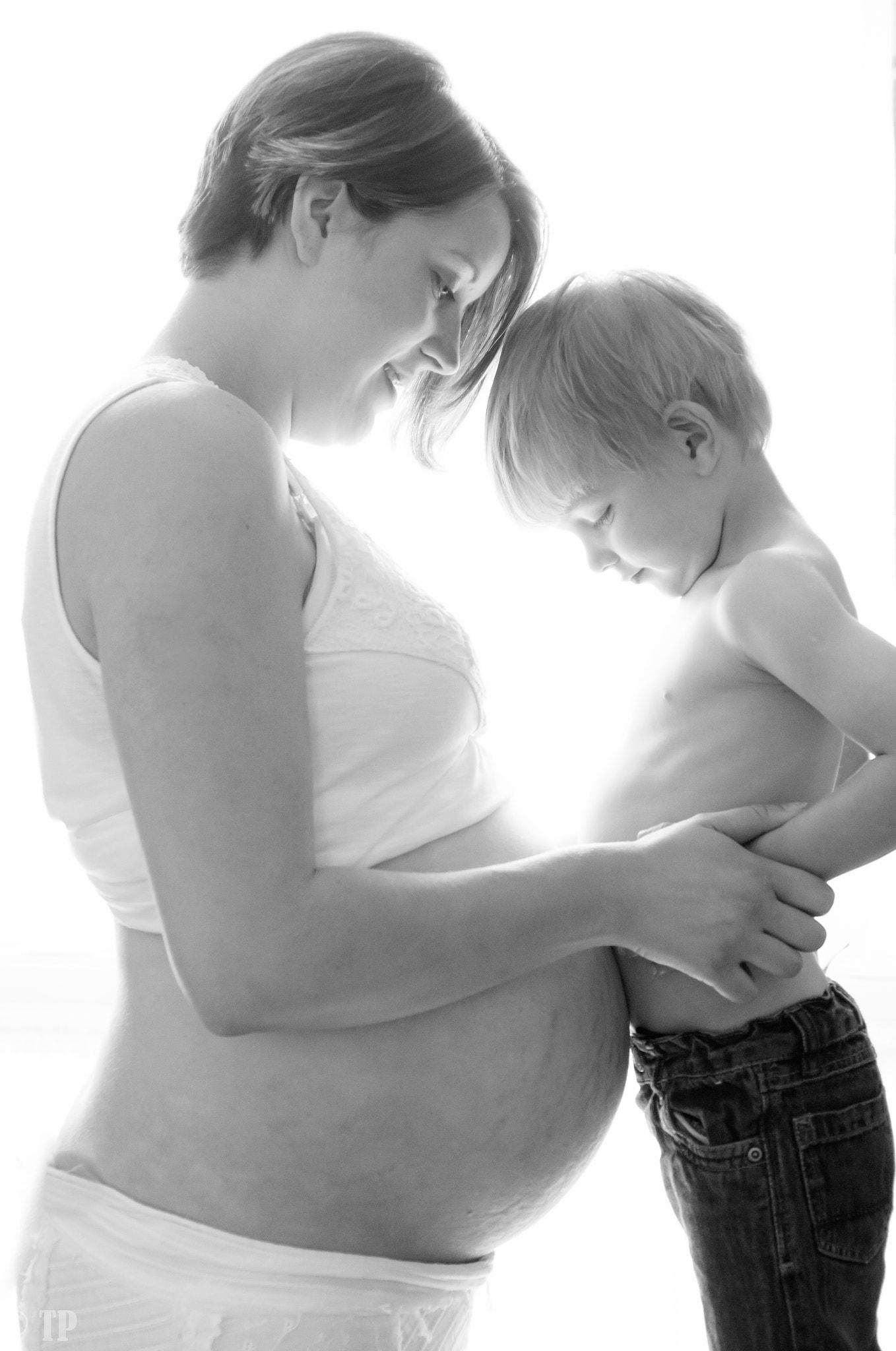 Sony ILCA-77M2 sample photo. Pregnant mother and son photography