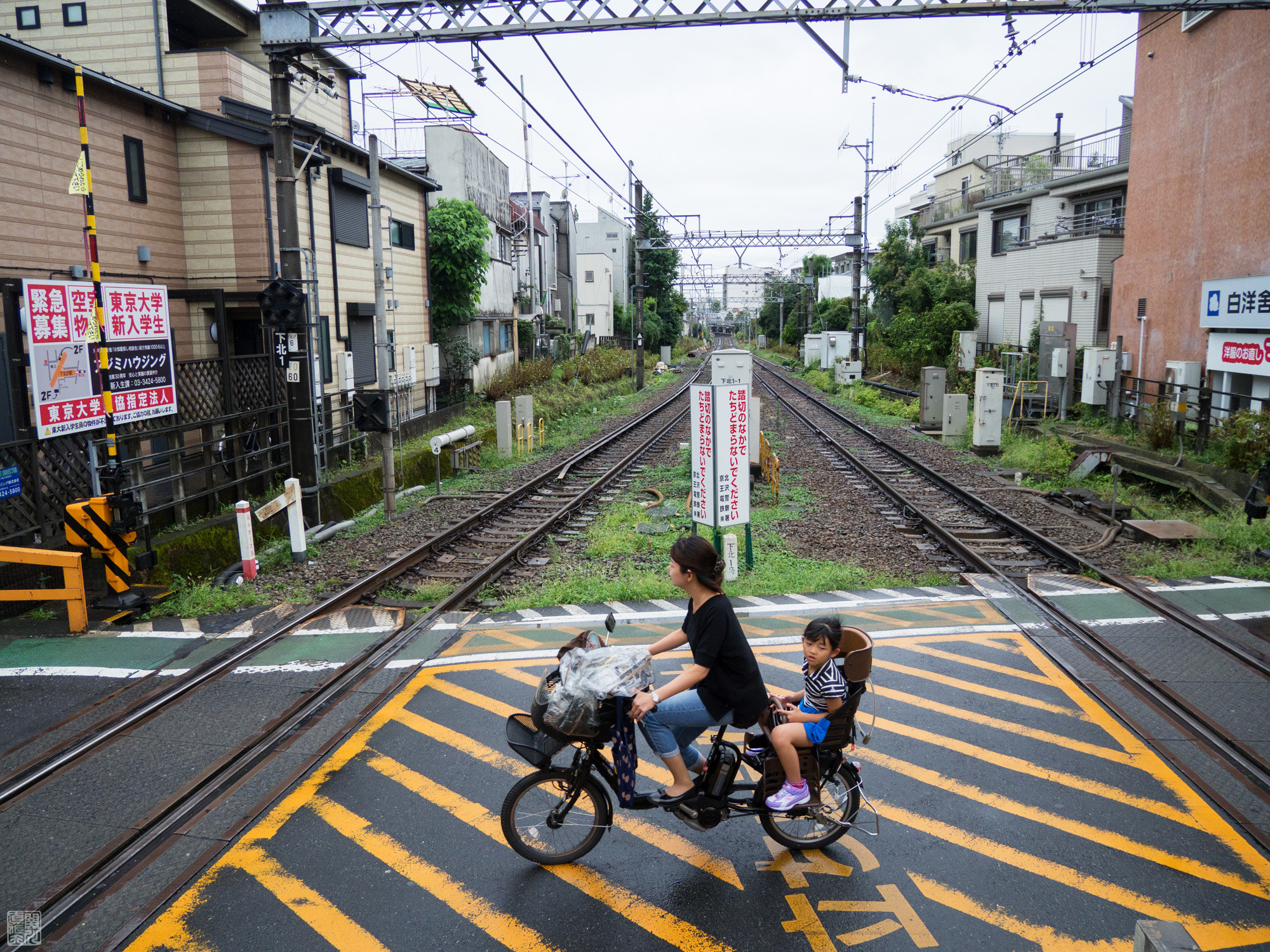 Olympus OM-D E-M10 II sample photo. Bicycle on the grade crossing photography