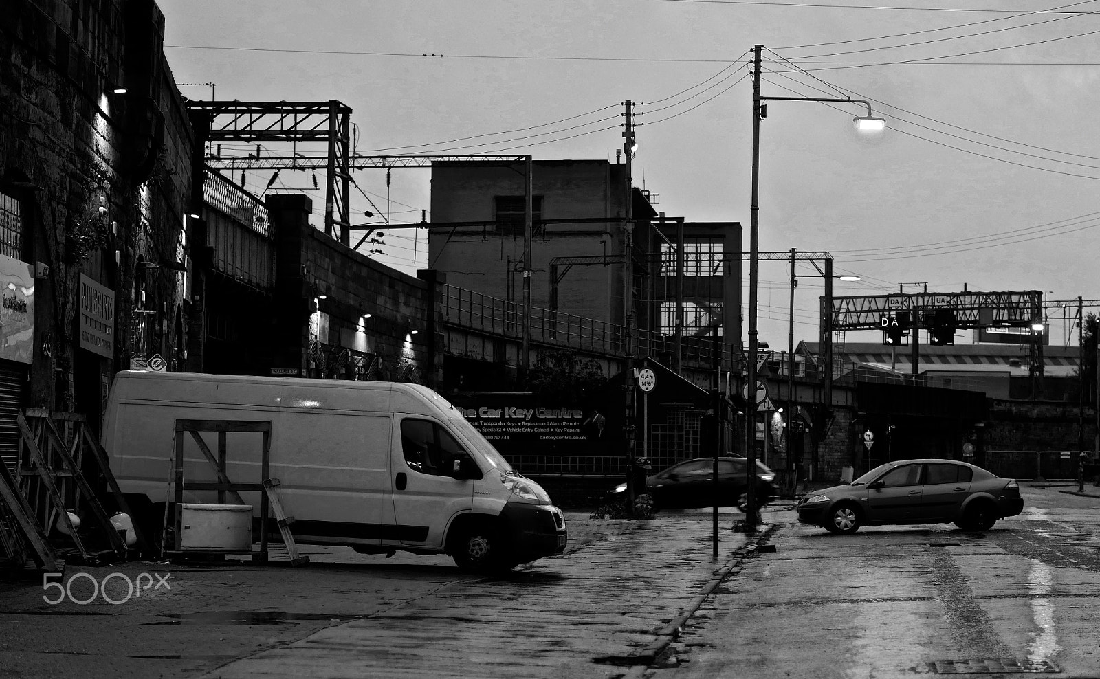 Panasonic Lumix DMC-GX8 + Panasonic Leica DG Nocticron 42.5mm F1.2 ASPH OIS sample photo. Below the railway in post industrial glasgow photography