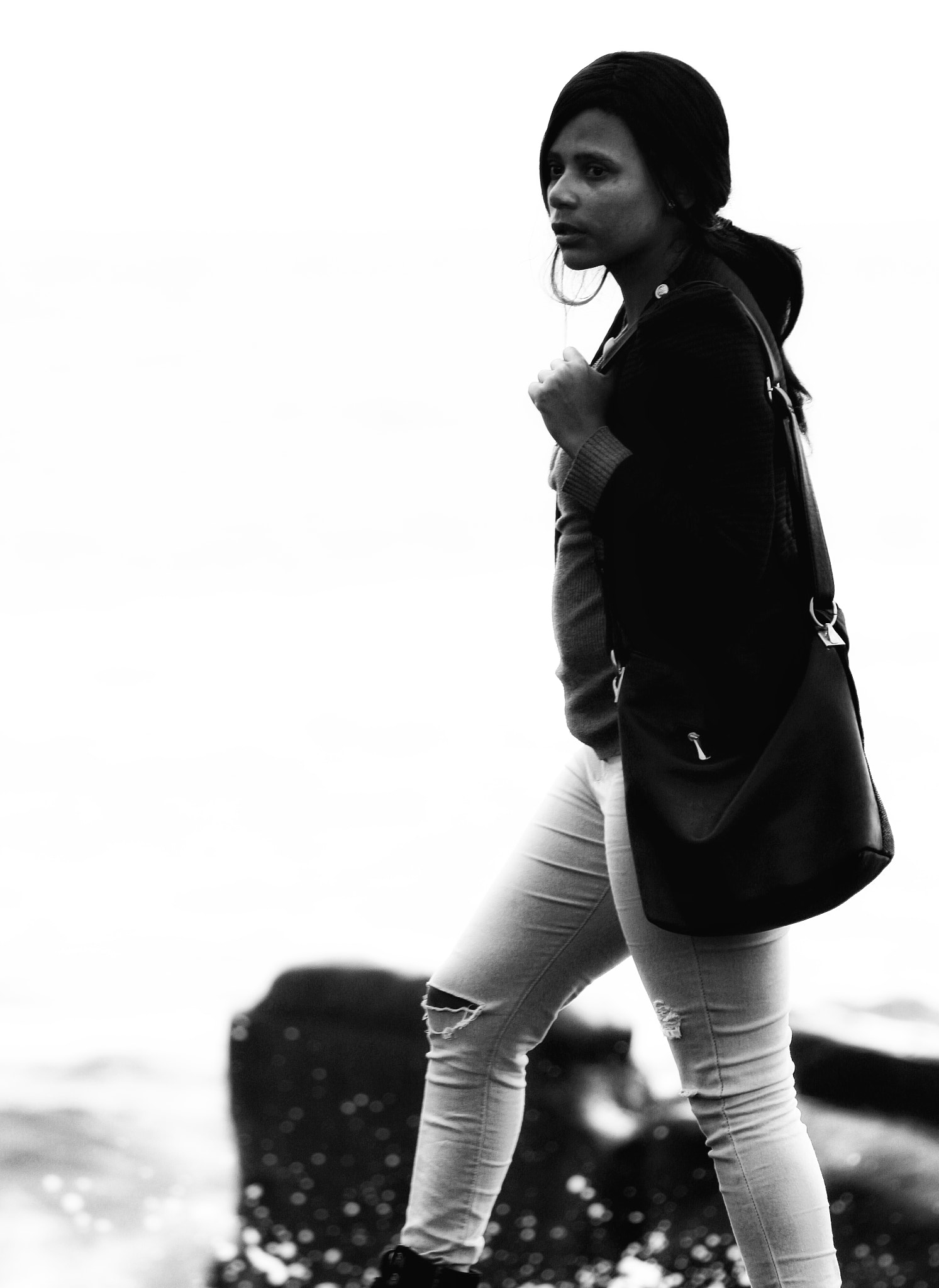 Tamron SP 150-600mm F5-6.3 Di VC USD sample photo. Went to the beach front found the lady waking on the rocks photography