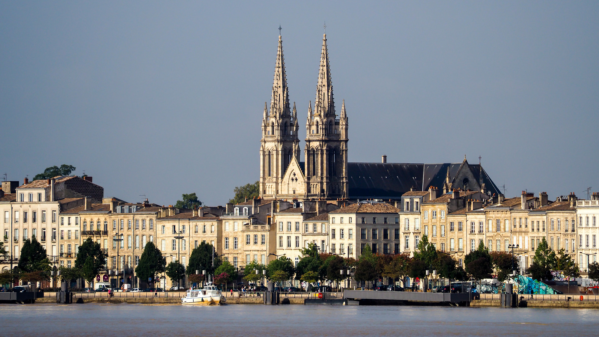 Olympus PEN-F sample photo. View across the river garonne towards the church of st martial photography
