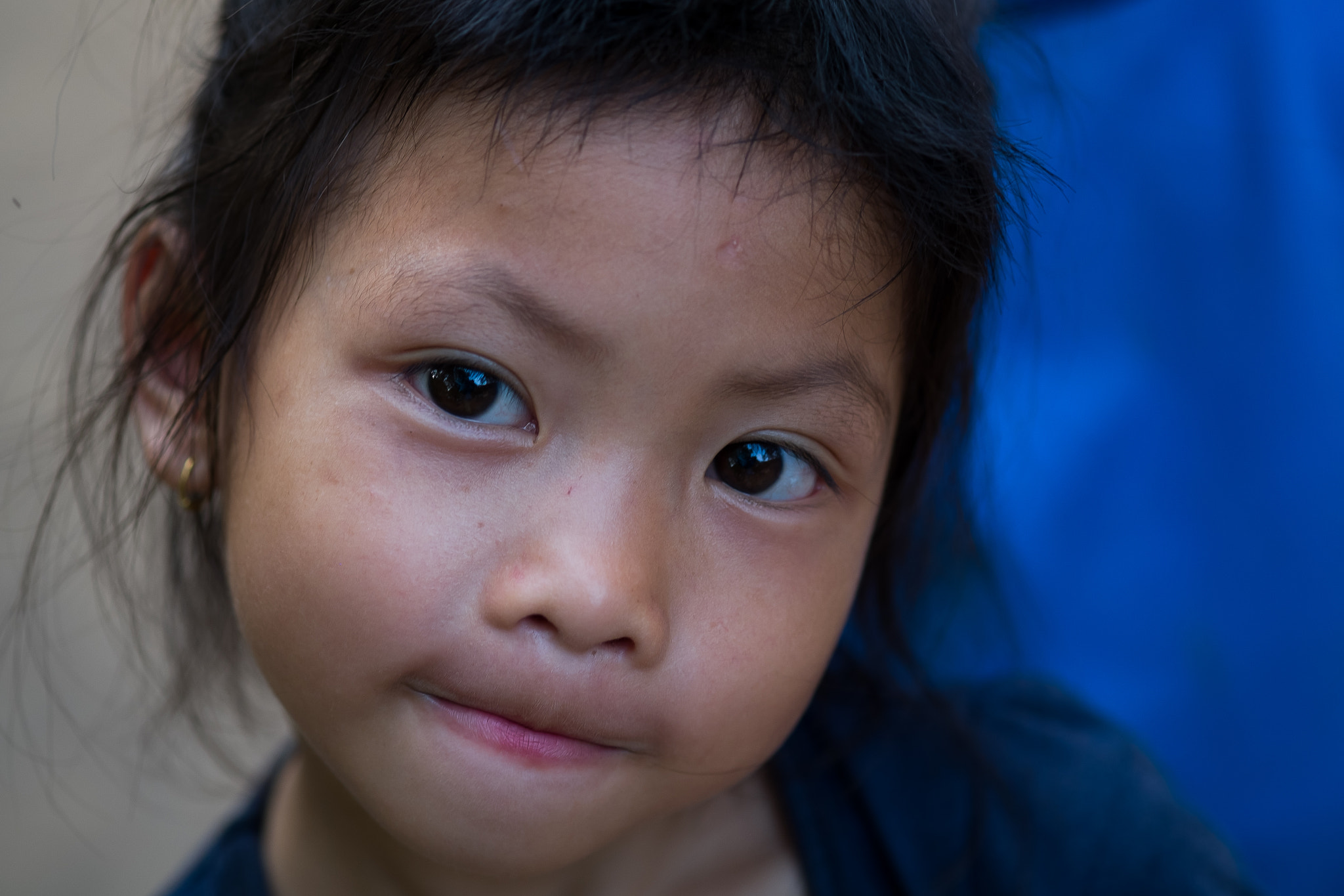 Fujifilm X-E1 + Fujifilm XF 60mm F2.4 R Macro sample photo. Luang prabang child photography