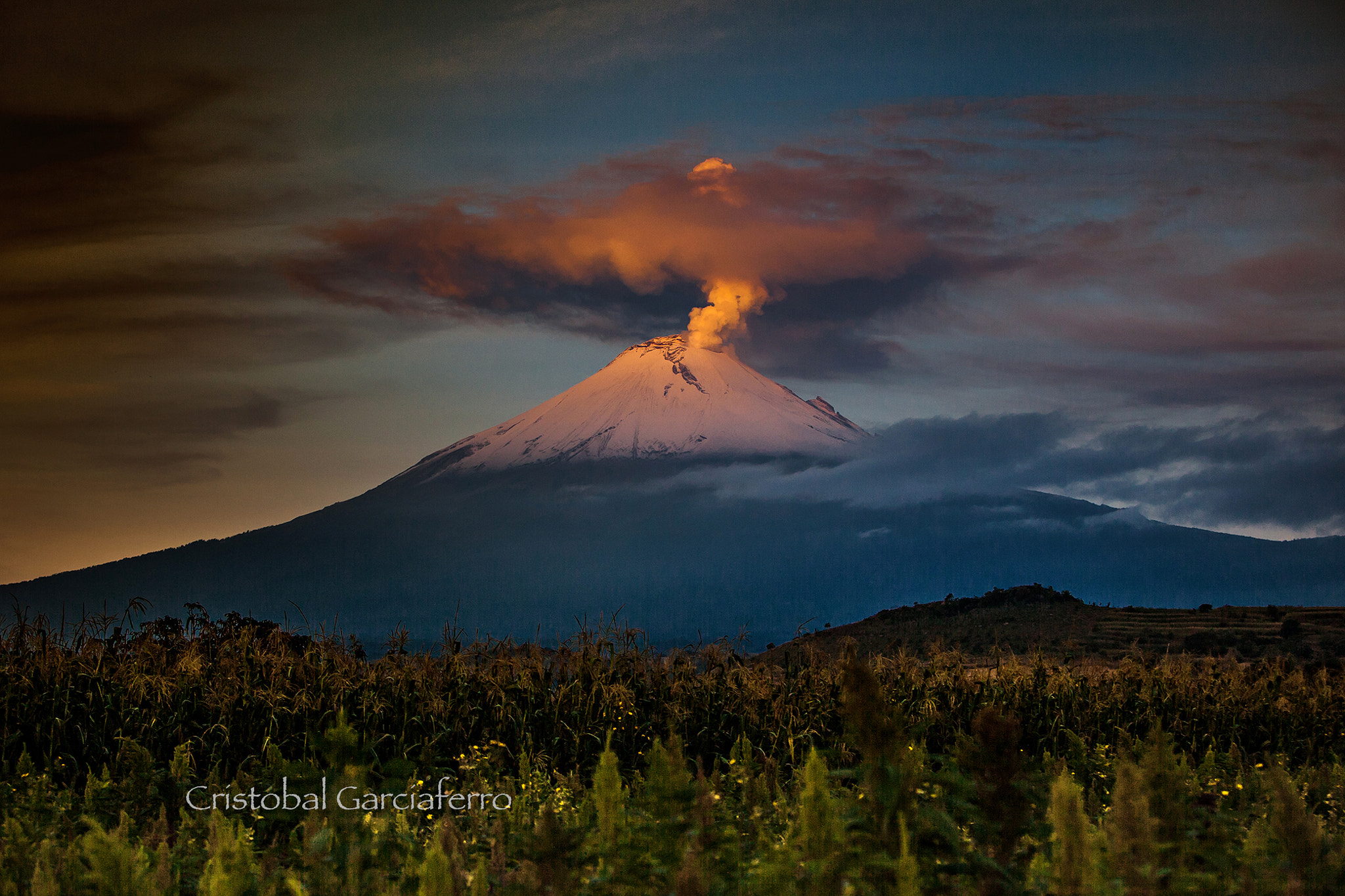 Canon EOS-1Ds Mark II + Canon EF 70-200mm F2.8L IS USM sample photo. Sunrise with smoking volcano photography