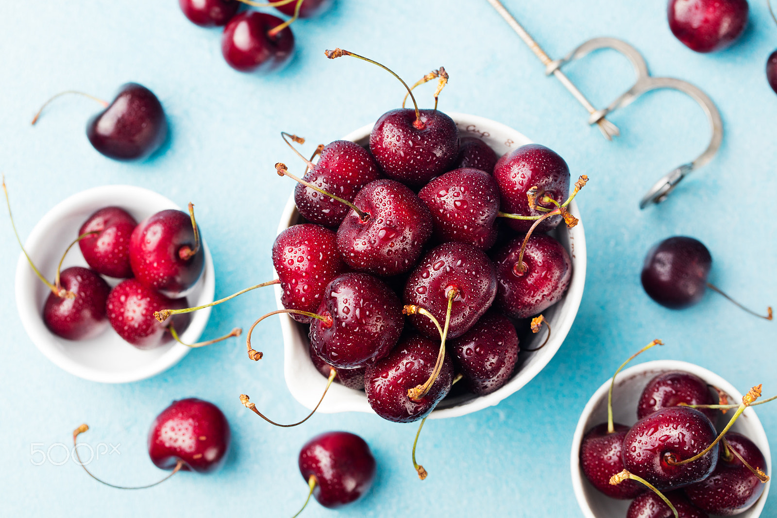 Canon EOS 5DS + Canon EF 100mm F2.8L Macro IS USM sample photo. Fresh ripe black cherries in a white bowl on a blue stone background top view photography