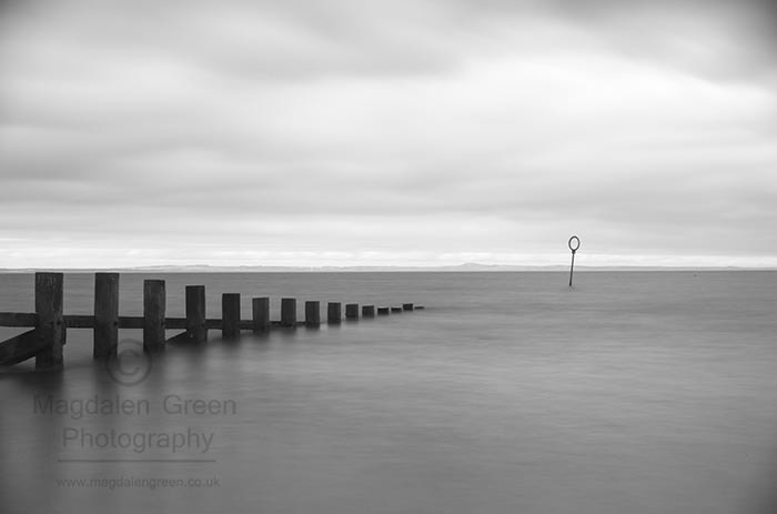 Nikon D700 + AF-S DX Zoom-Nikkor 18-55mm f/3.5-5.6G ED sample photo. Calm and still - zen view  - black and white - scottish coast photography