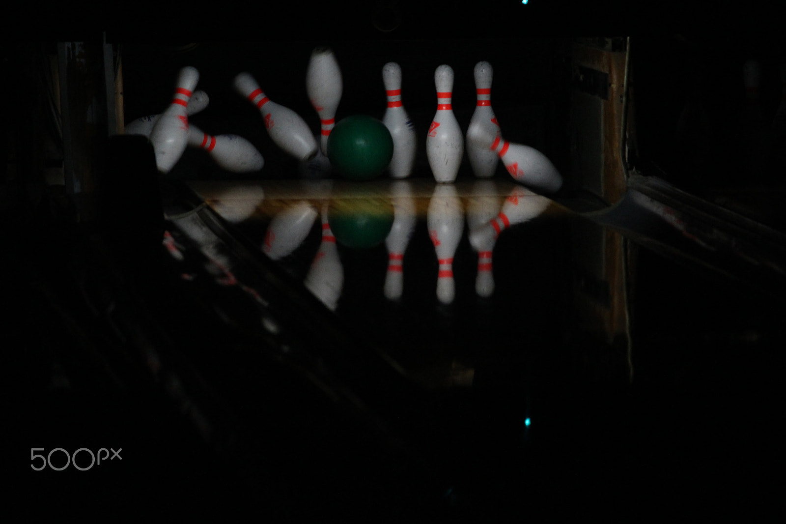 Canon EF-S 55-250mm F4-5.6 IS sample photo. The bowling pins go smash photography