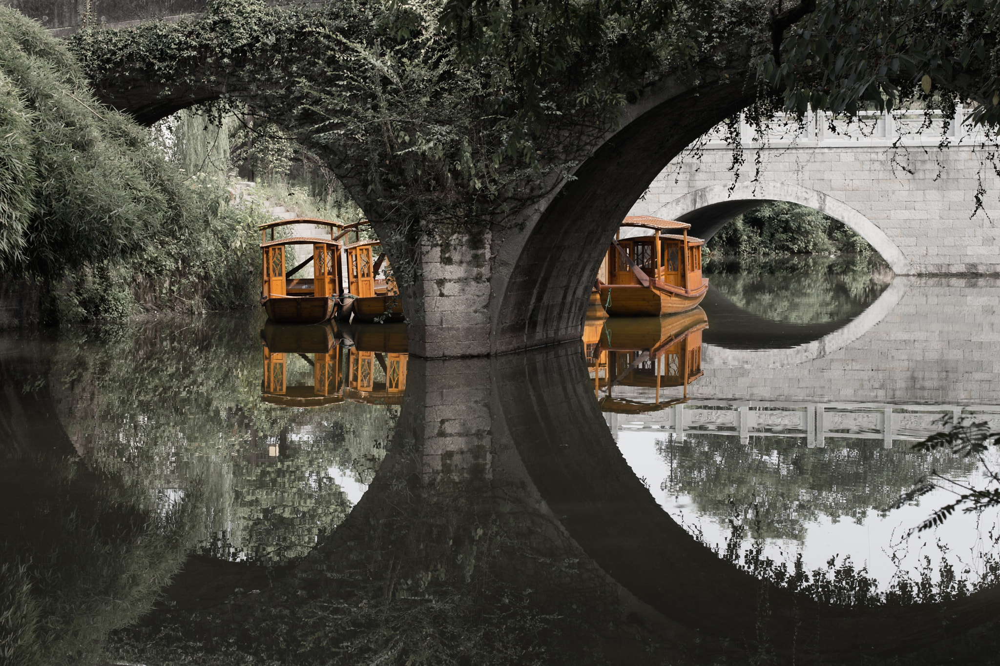 Nikon Df sample photo. Wooden boat below the bridge photography