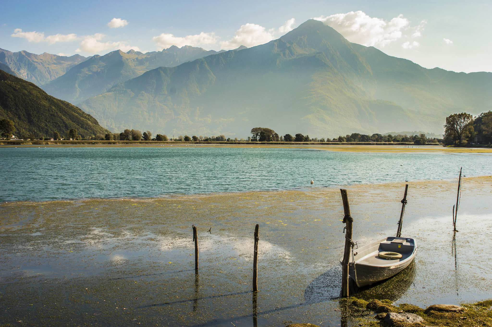 Nikon D3200 + Tamron SP 24-70mm F2.8 Di VC USD sample photo. Boat, river and alps photography