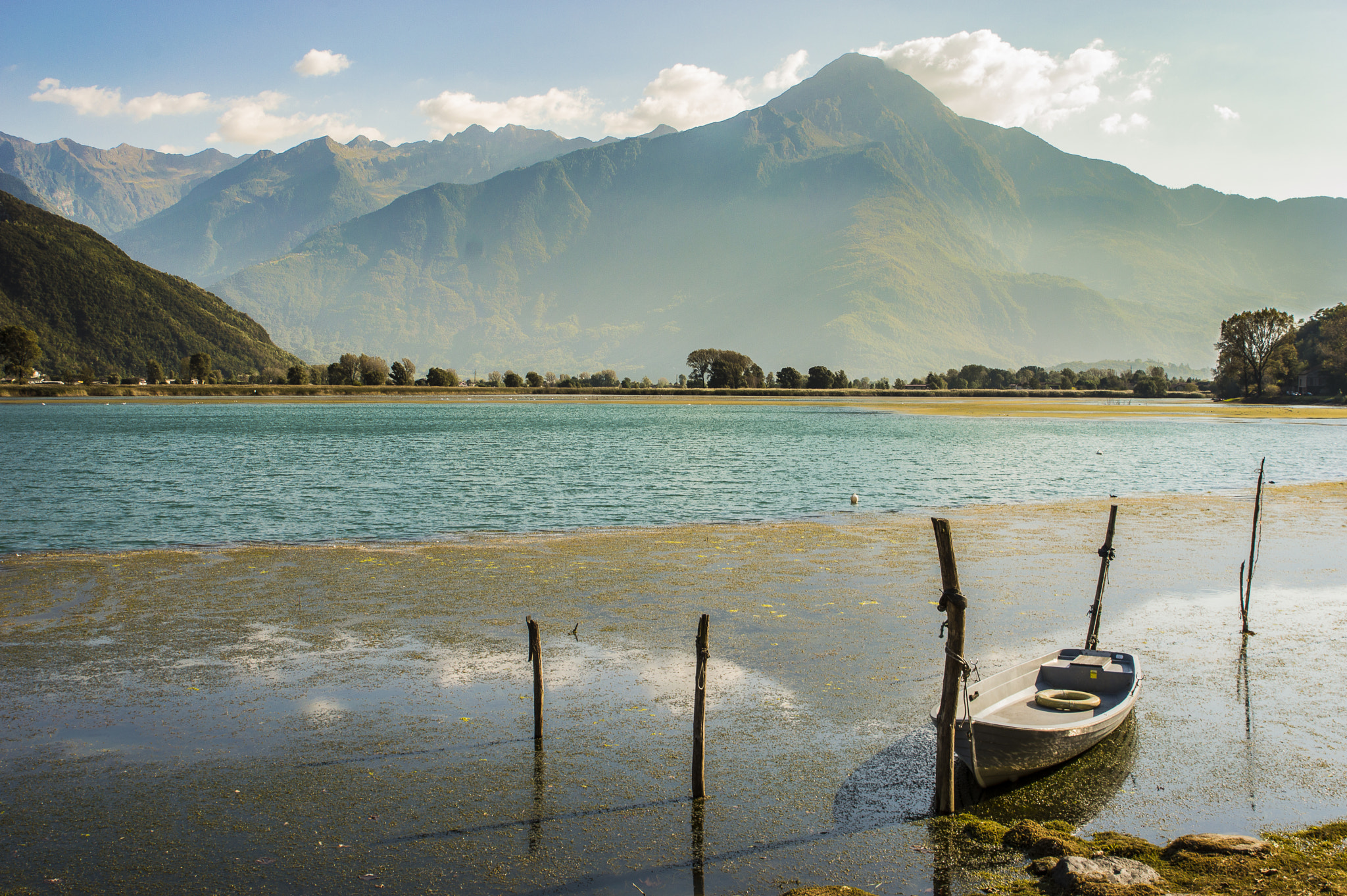 Tamron SP 24-70mm F2.8 Di VC USD sample photo. Boat, river and alps photography