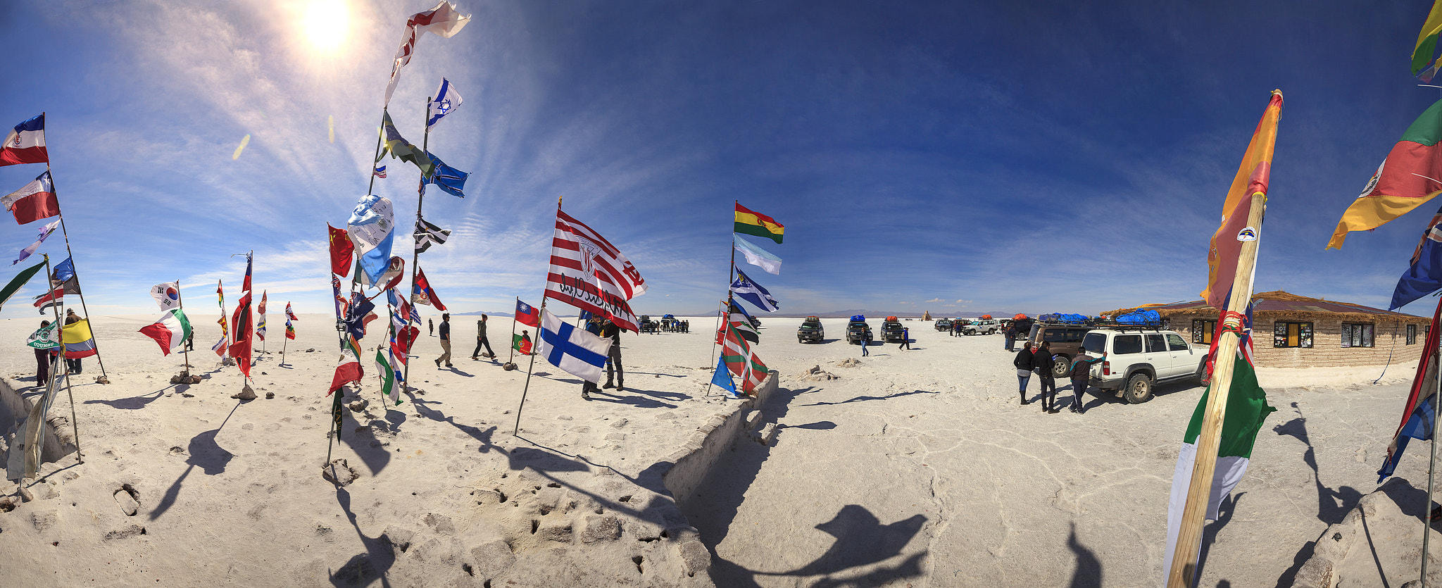 Canon EF 16-35mm F4L IS USM sample photo. Uyuni flags at salt hotel photography