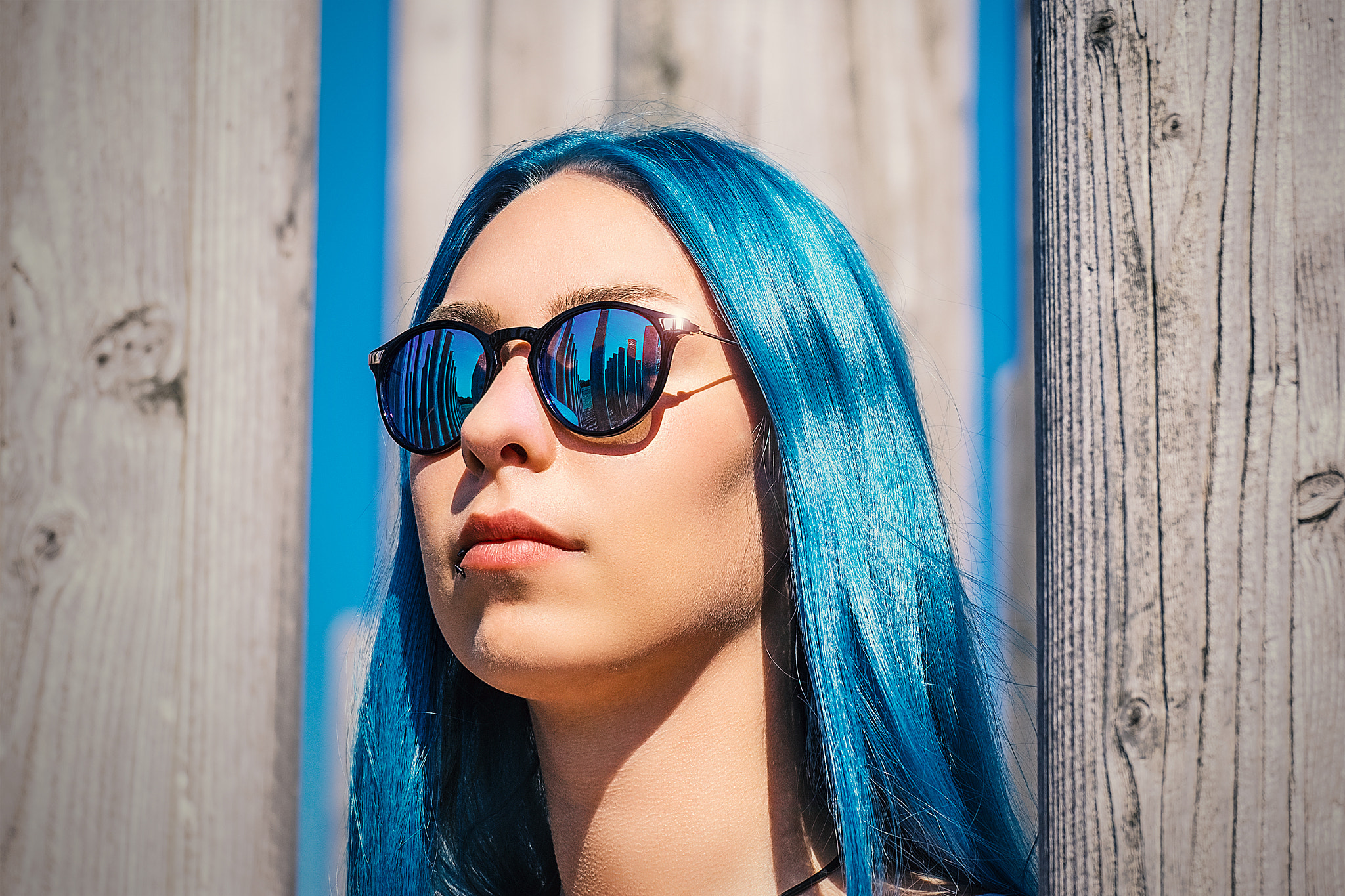 Fujifilm X-T10 + Fujifilm XC 50-230mm F4.5-6.7 OIS II sample photo. Sun glasses in blue photography