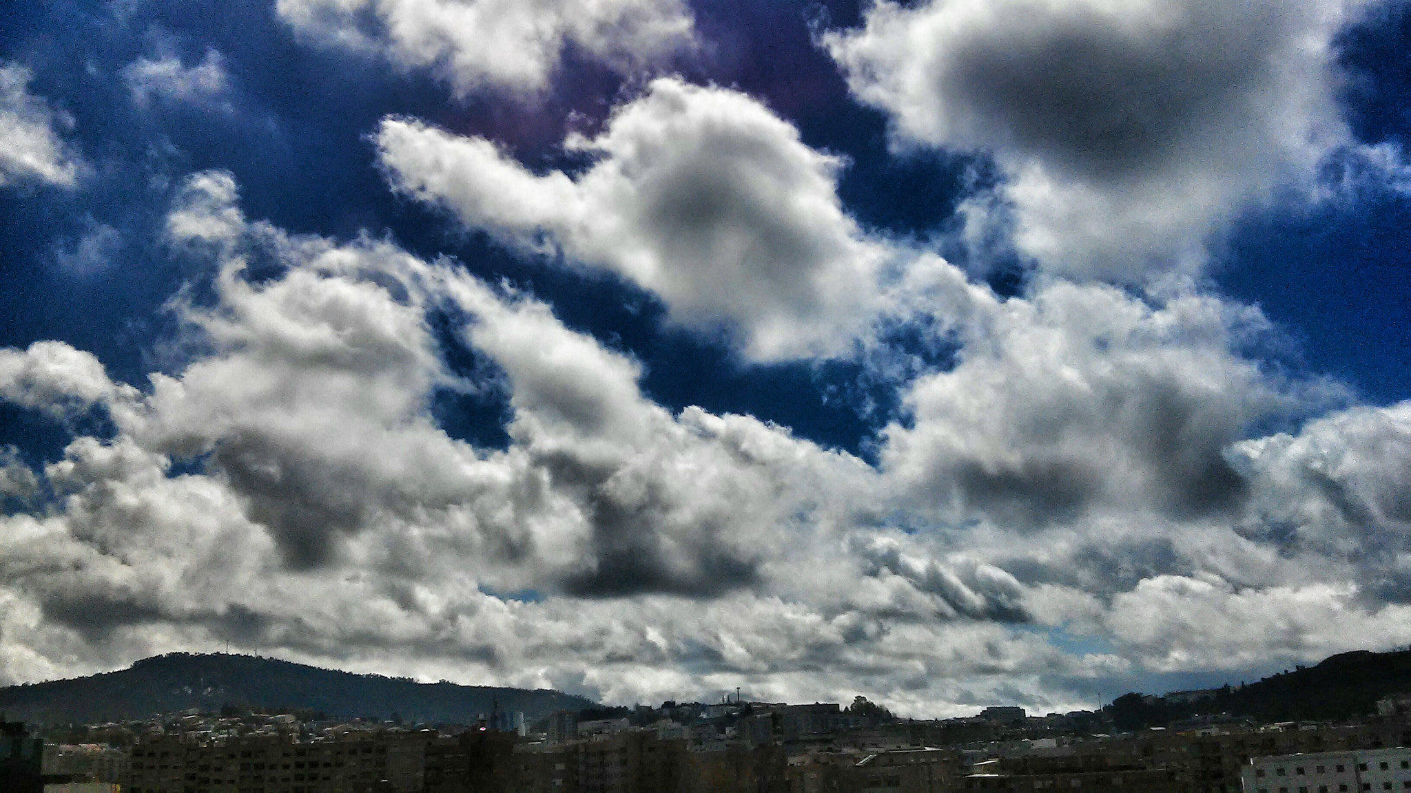 LG D410 sample photo. Portuguese clouds photography