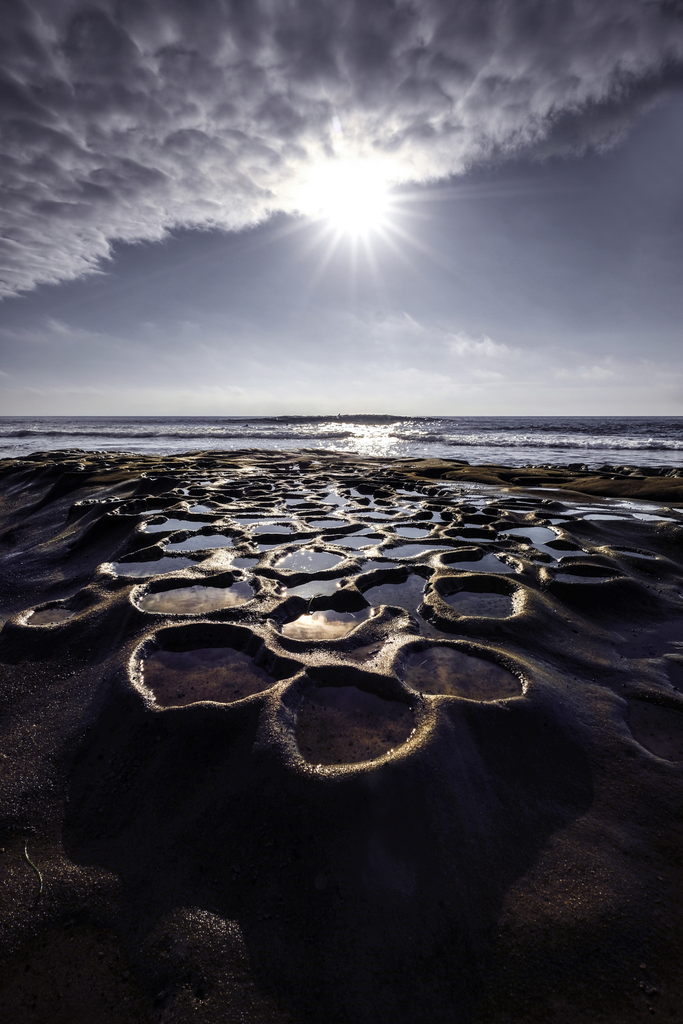 Fujifilm X-Pro2 + ZEISS Touit 12mm F2.8 sample photo. Pothole sun photography