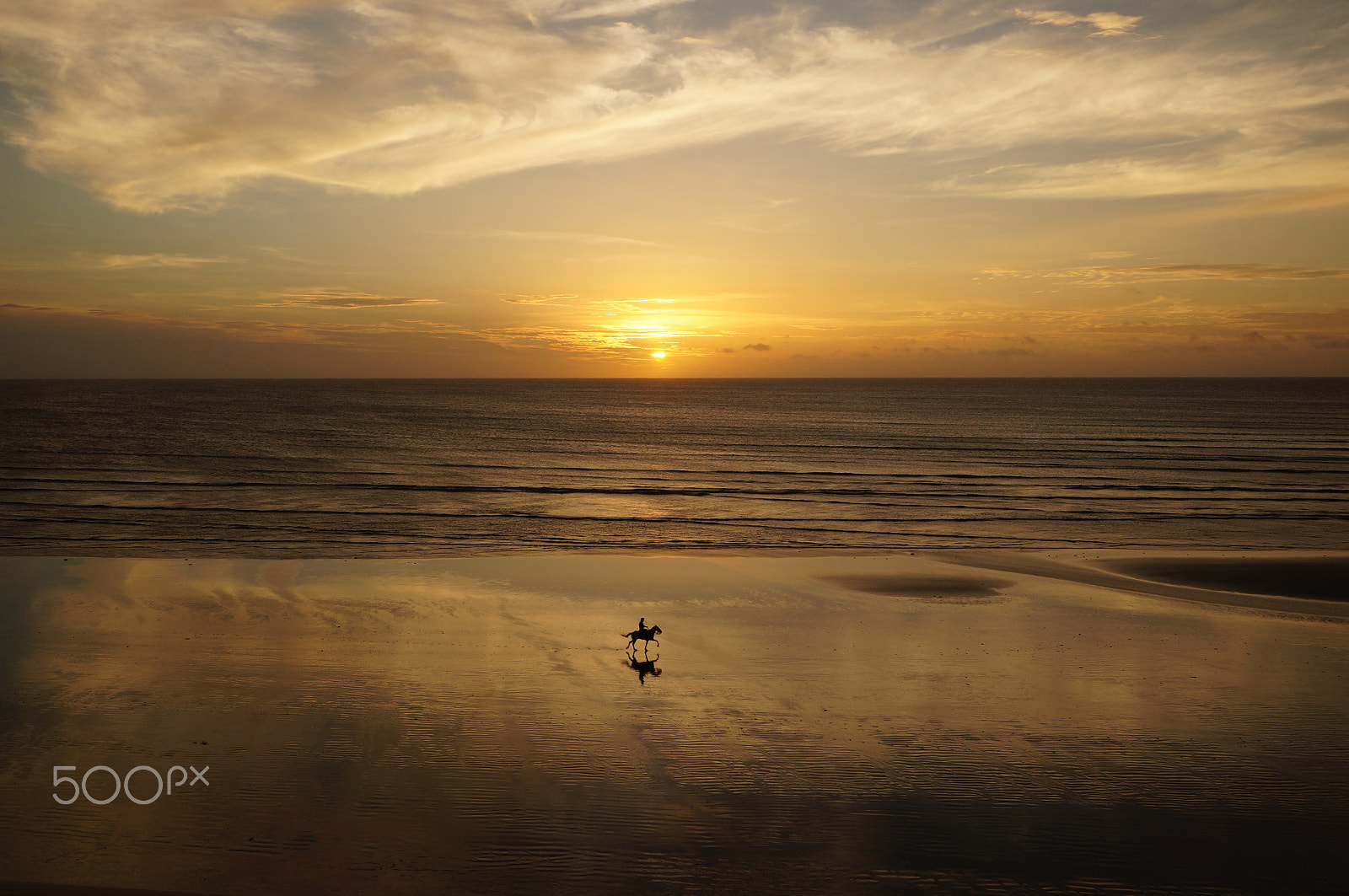 Sony Alpha NEX-3N + Sony E 18-50mm F4-5.6 sample photo. Sunset ride on the beach photography