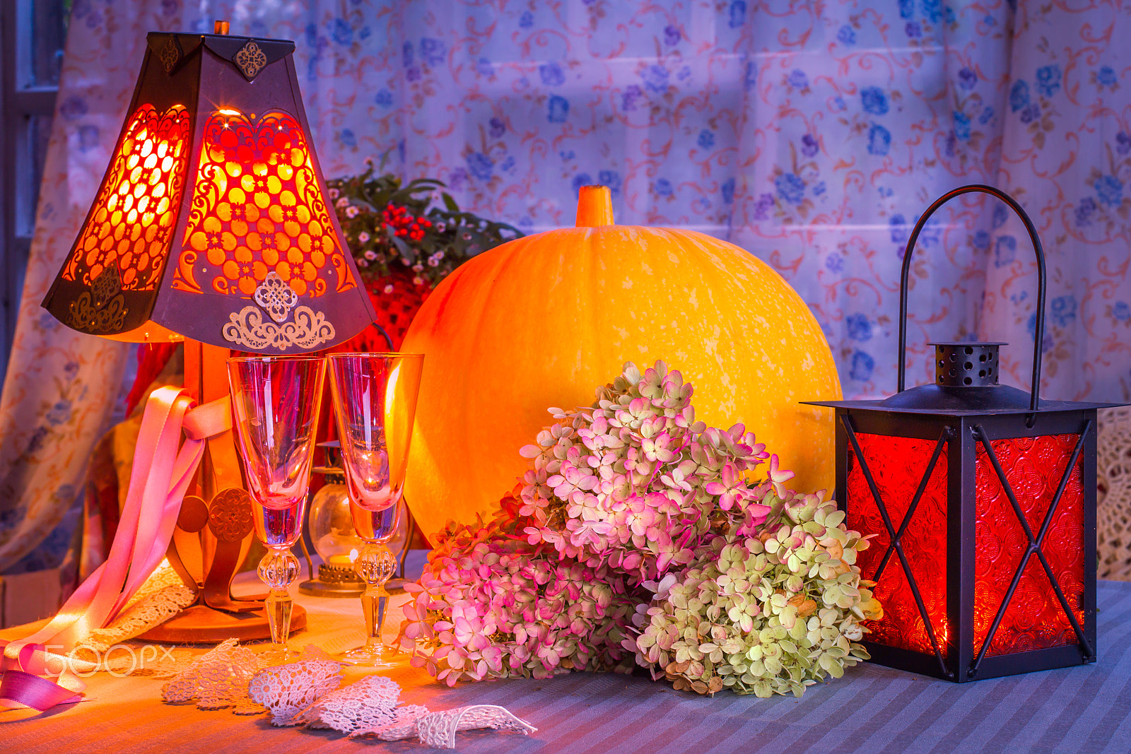 Canon EOS-1D Mark IV sample photo. Pumpkin, glass cups, hydrangea, fonr and lamp warm light. romant photography