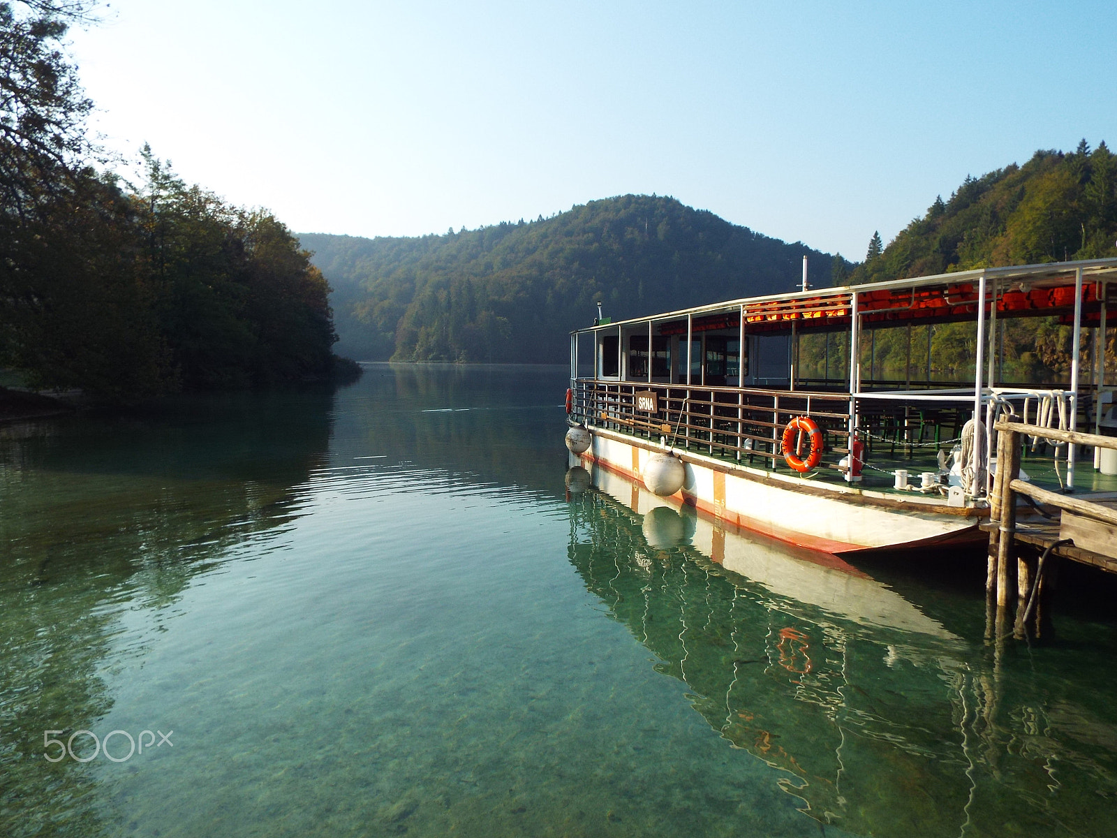 Fujifilm FinePix S8400W sample photo. Boat in transparent waters photography